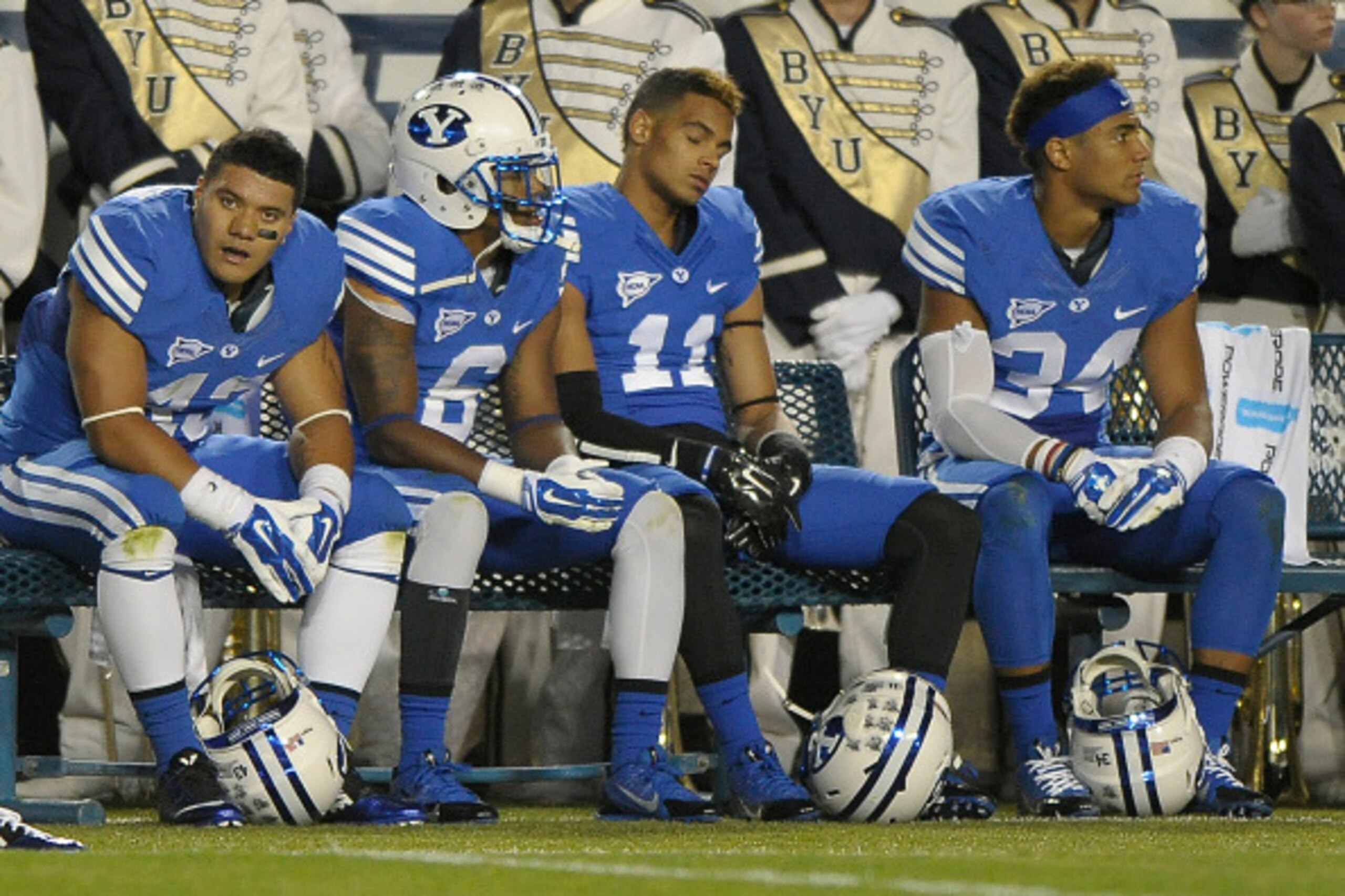PROVO, UT - OCTOBER 3: Brigham Young Cougar players sit on the bench at the start of the fourth quarter against the Utah State Aggies at LaVell Edwards Stadium on October 3, 2014 in Provo, Utah. (Photo by Gene Sweeney Jr/Getty Images )