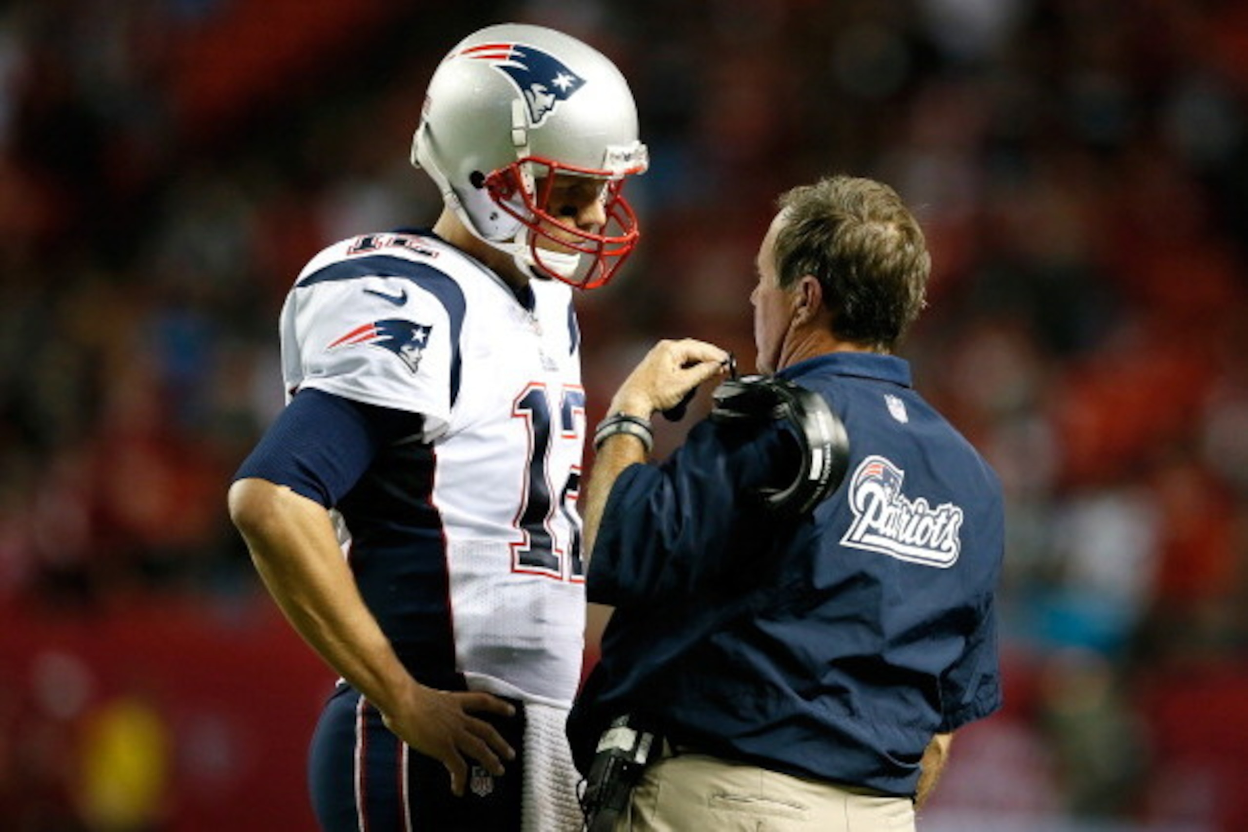 ATLANTA, GA - SEPTEMBER 29: Tom Brady #12 of the New England Patriots converses with head coach Bill Belichick during the game against the Atlanta Falcons at Georgia Dome on September 29, 2013 in Atlanta, Georgia. (Photo by Kevin C. Cox/Getty Images) ATLANTA, GA - SEPTEMBER 29: Tom Brady #12 of the New England Patriots converses with head coach Bill Belichick during the game against the Atlanta Falcons at Georgia Dome on September 29, 2013 in Atlanta, Georgia. (Photo by Kevin C. Cox/Getty Images)