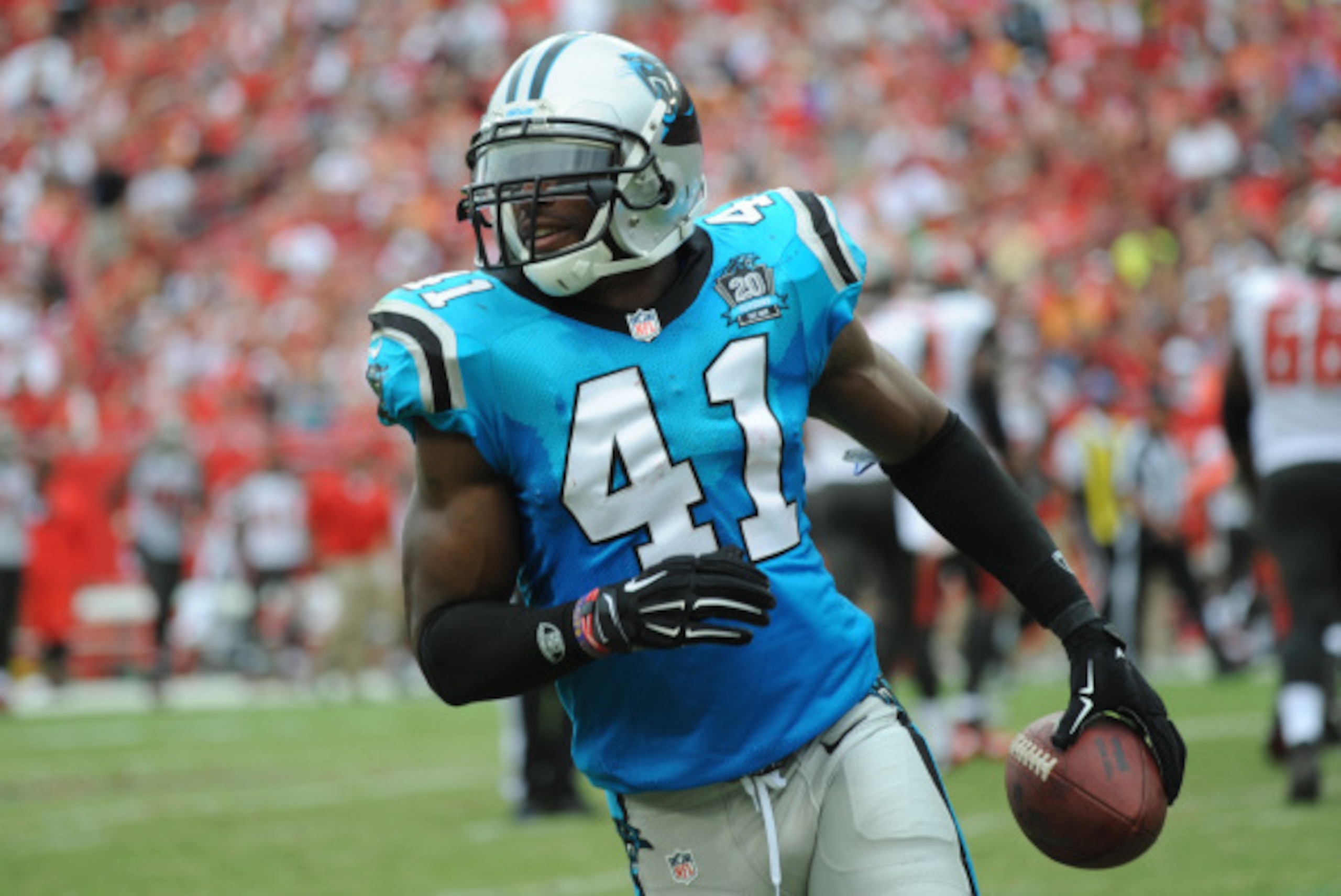 TAMPA, FL - SEPTEMBER 7: Strong safety Roman Harper #41 of the Carolina Panthers heads to the bench after making an interception against the Tampa Bay Buccaneers at Raymond James Stadium on September 7, 2014 in Tampa, Florida. (Photo by Cliff McBride/Get TAMPA, FL - SEPTEMBER 7: Strong safety Roman Harper #41 of the Carolina Panthers heads to the bench after making an interception against the Tampa Bay Buccaneers at Raymond James Stadium on September 7, 2014 in Tampa, Florida. (Photo by Cliff McBride/Get