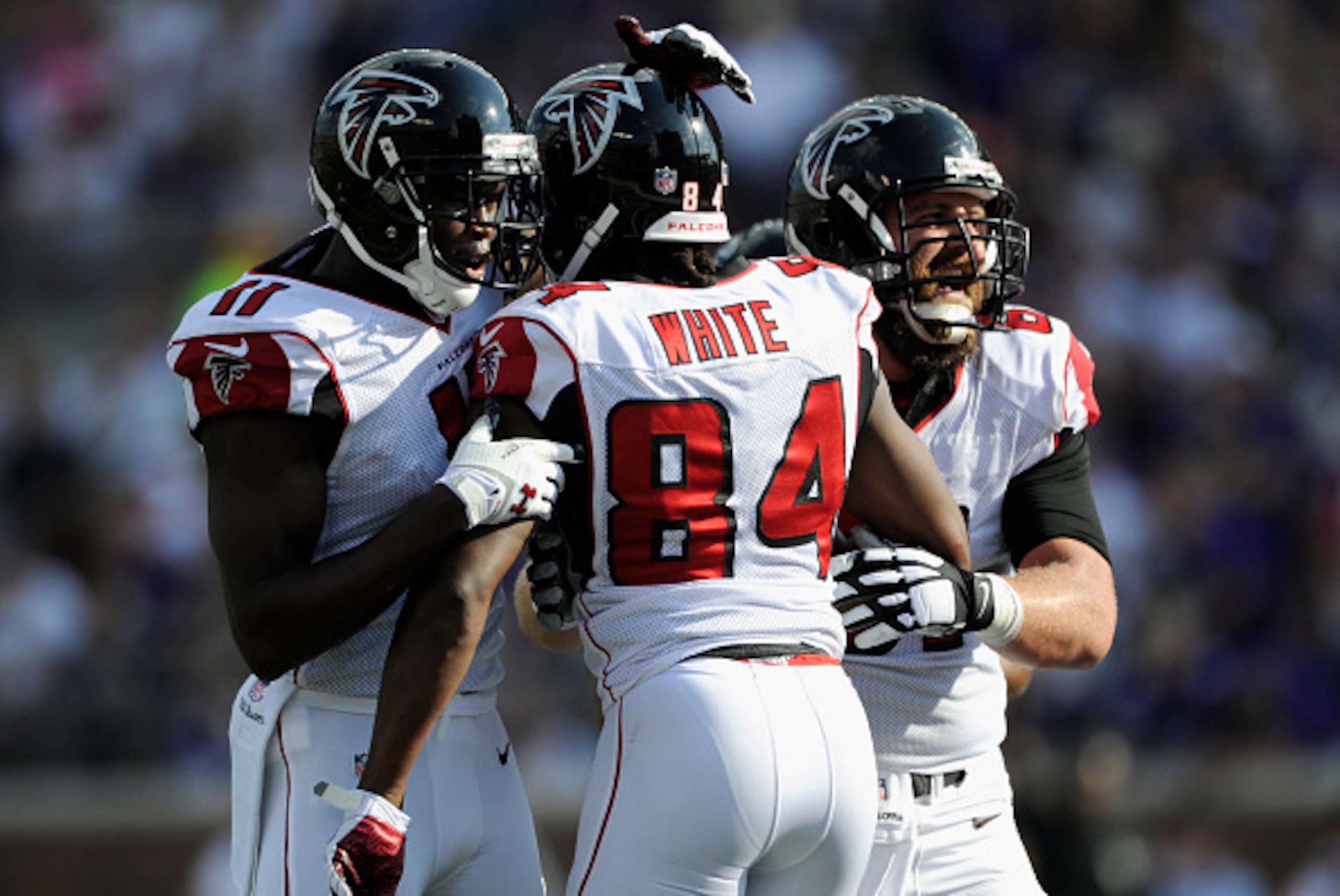 MINNEAPOLIS, MN - SEPTEMBER 28: Julio Jones #11 and Joe Hawley #61 of the Atlanta Falcons congratulate teammate Roddy White #84 on a touchdown against the Minnesota Vikings during the first quarter of the game on September 28, 2014 at TCF Bank Stadium in MINNEAPOLIS, MN - SEPTEMBER 28: Julio Jones #11 and Joe Hawley #61 of the Atlanta Falcons congratulate teammate Roddy White #84 on a touchdown against the Minnesota Vikings during the first quarter of the game on September 28, 2014 at TCF Bank Stadium in