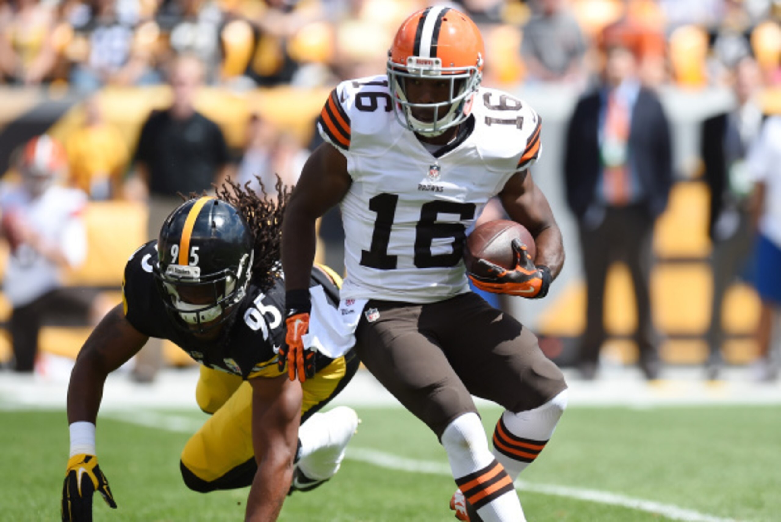 PITTSBURGH, PA - SEPTEMBER 7:  Andrew Hawkins #16 of the Cleveland Browns carries the ball in front of Jarvis Jones #95 of the Pittsburgh Steelers during the first quarter at Heinz Field on September 7, 2014 in Pittsburgh, Pennsylvania.  (Photo by Joe Sar