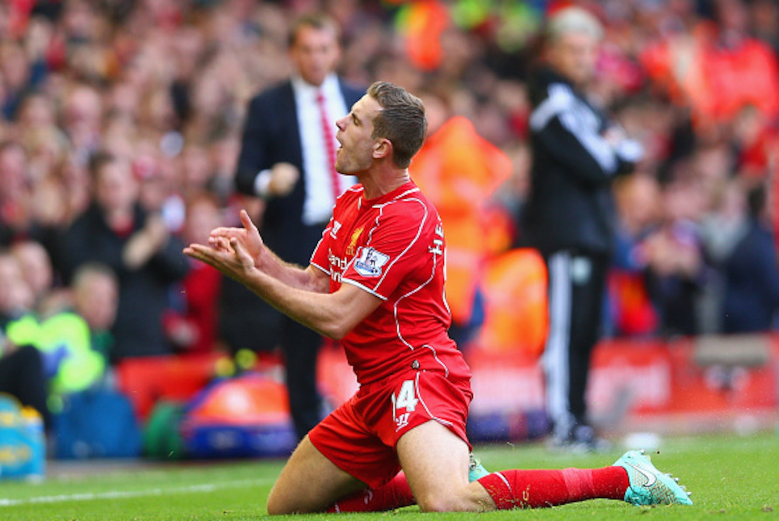 LIVERPOOL, ENGLAND - OCTOBER 04:  Jordan Henderson of Liverpool celebrates scoring their second goal during the Barclays Premier League match between Liverpool and West Bromwich Albion at Anfield on October 4, 2014 in Liverpool, England.  (Photo by Clive 