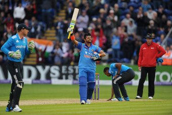 CARDIFF, WALES - AUGUST 27:  India batsman Suresh Raina celebrates his century during the 2nd  Royal London One Day International match between England and India at SWALEC Stadium on August 27, 2014 in Cardiff, Wales.  (Photo by Stu Forster/Getty Images)