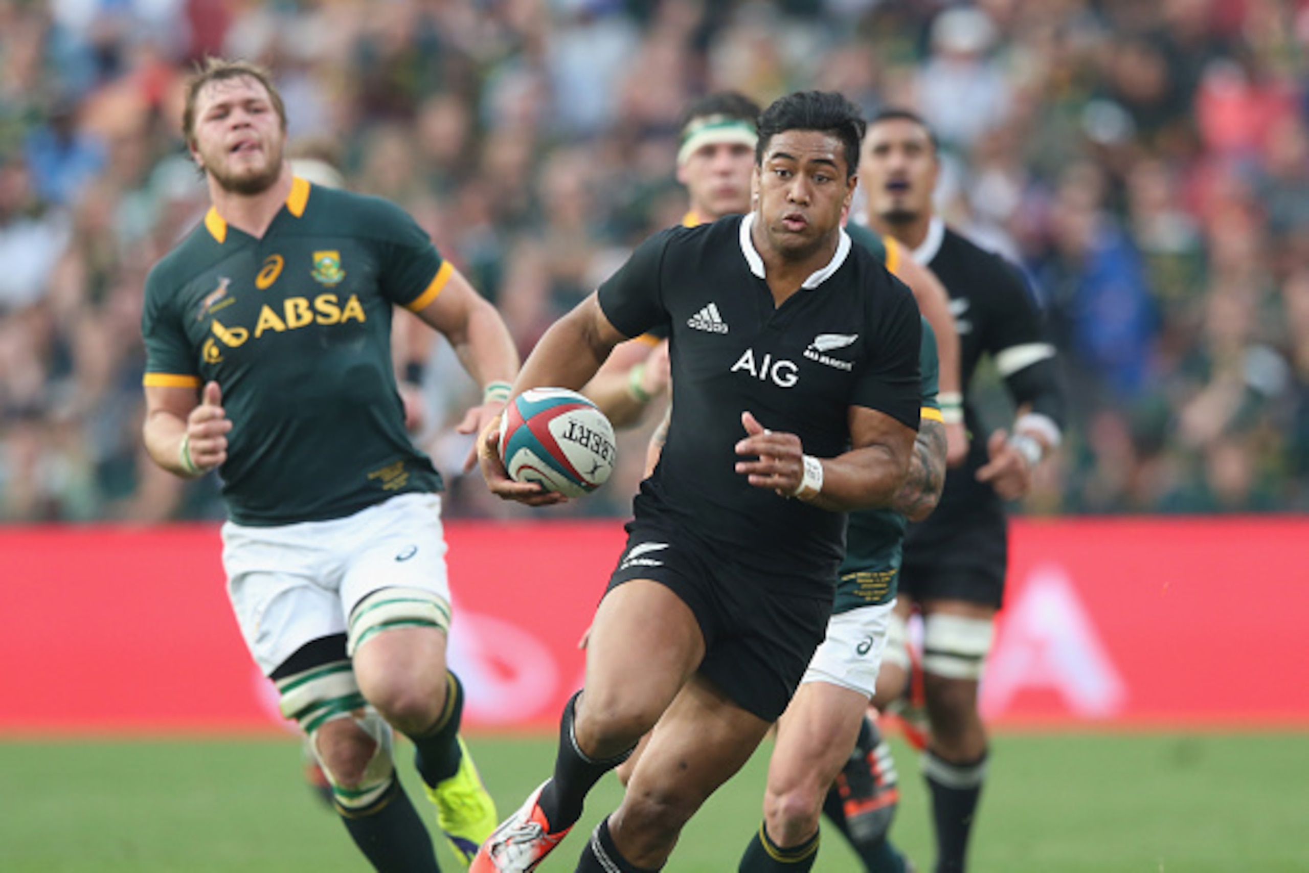 JOHANNESBURG, SOUTH AFRICA - OCTOBER 04: Julian Savea of the All Blacks breaks with the ball during the Rugby Championship match between the South African Springboks and the New Zealand All Blacks at Ellis Park Stadium on October 4, 2014 in Johannesburg, 