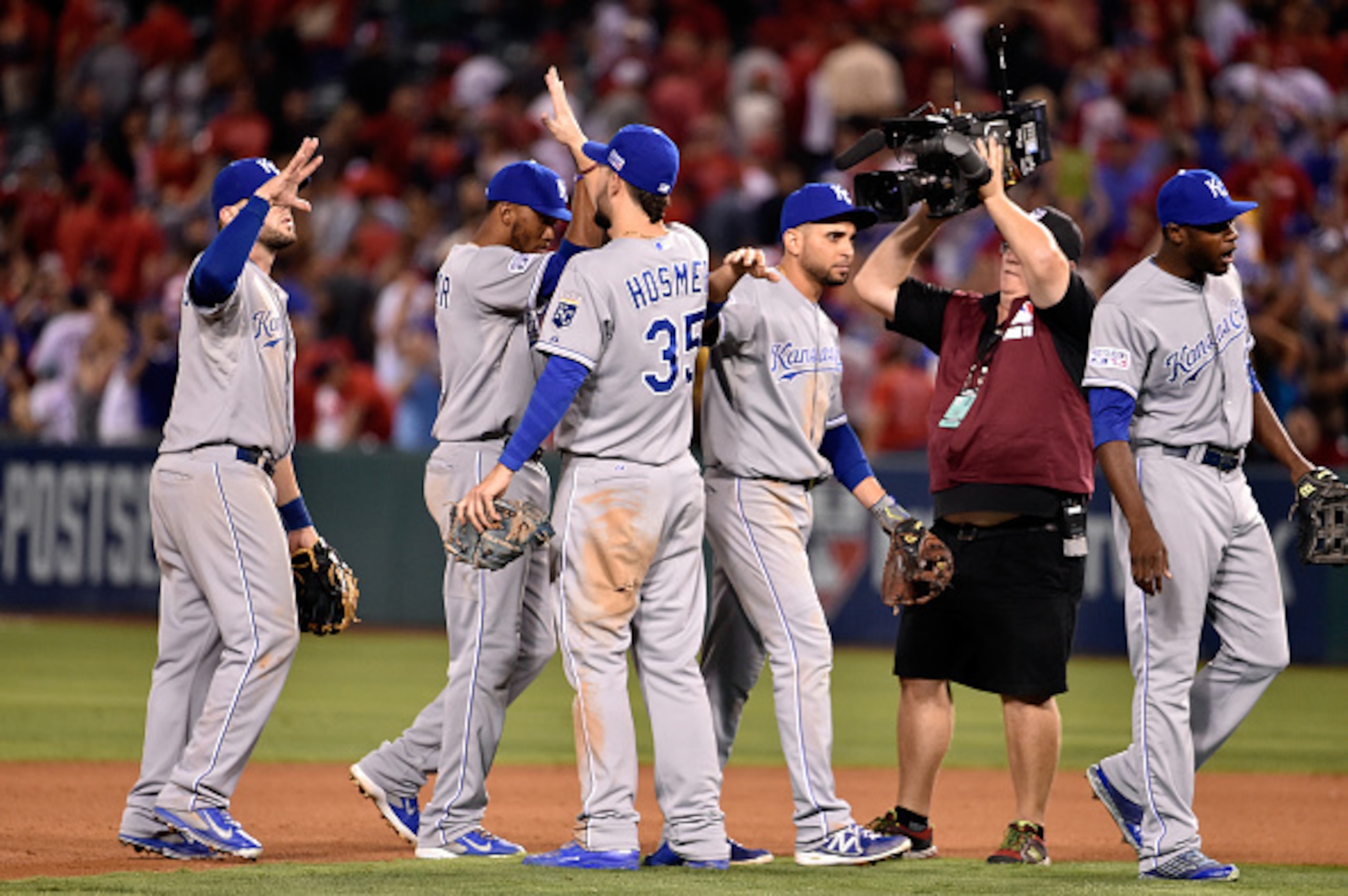 ANAHEIM, CA - OCTOBER 03:  Eric Hosmer #35 of the Kansas City Royals celebrates with teammates after defeating the Los Angeles Angels 4-1 in eleven innings in Game Two of the American League Division Series at Angel Stadium of Anaheim on October 3, 2014 i