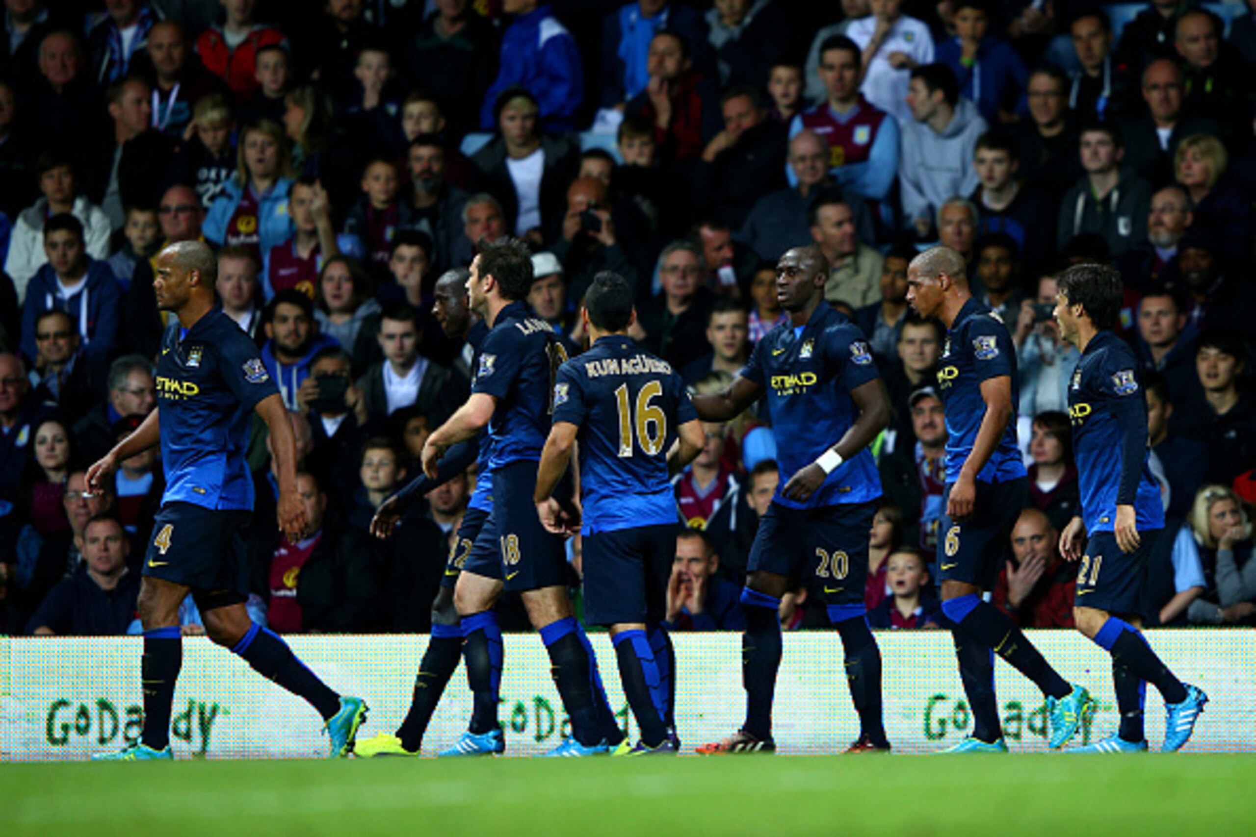 BIRMINGHAM, ENGLAND - OCTOBER 04:  Yaya Toure (2nd L) of Manchester City celebrates with team-mates after scoring the opening goal during the Barclays Premier League match between Aston Villa and Manchester City at Villa Park on October 4, 2014 in Birming