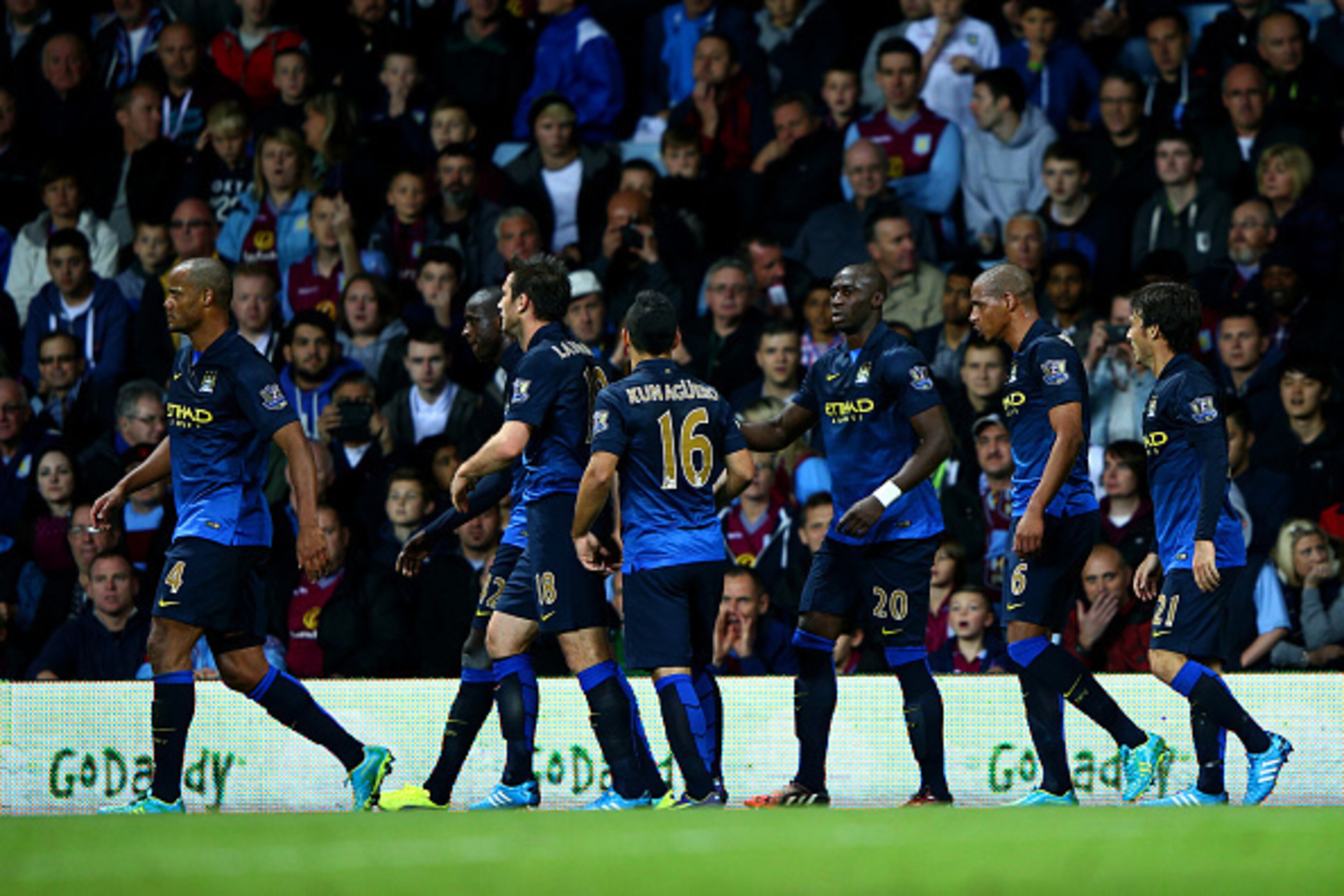 BIRMINGHAM, ENGLAND - OCTOBER 04:  Yaya Toure (2nd L) of Manchester City celebrates with team-mates after scoring the opening goal during the Barclays Premier League match between Aston Villa and Manchester City at Villa Park on October 4, 2014 in Birming