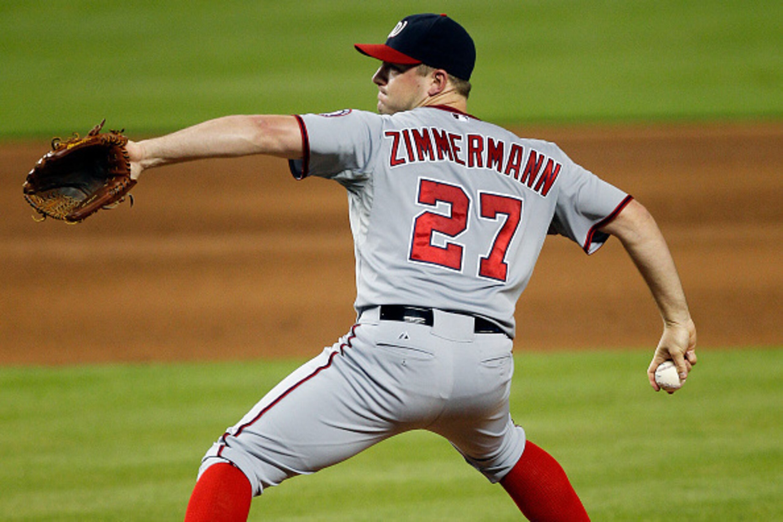MIAMI, FL - SEPTEMBER 20: Jordan Zimmermann #27 of the Washington Nationals delivers a pitch against the Miami Marlins in the fourth inning at Marlins Park on September 20, 2014 in Miami, Florida. (Photo by Eliot J. Schechter/Getty Images)