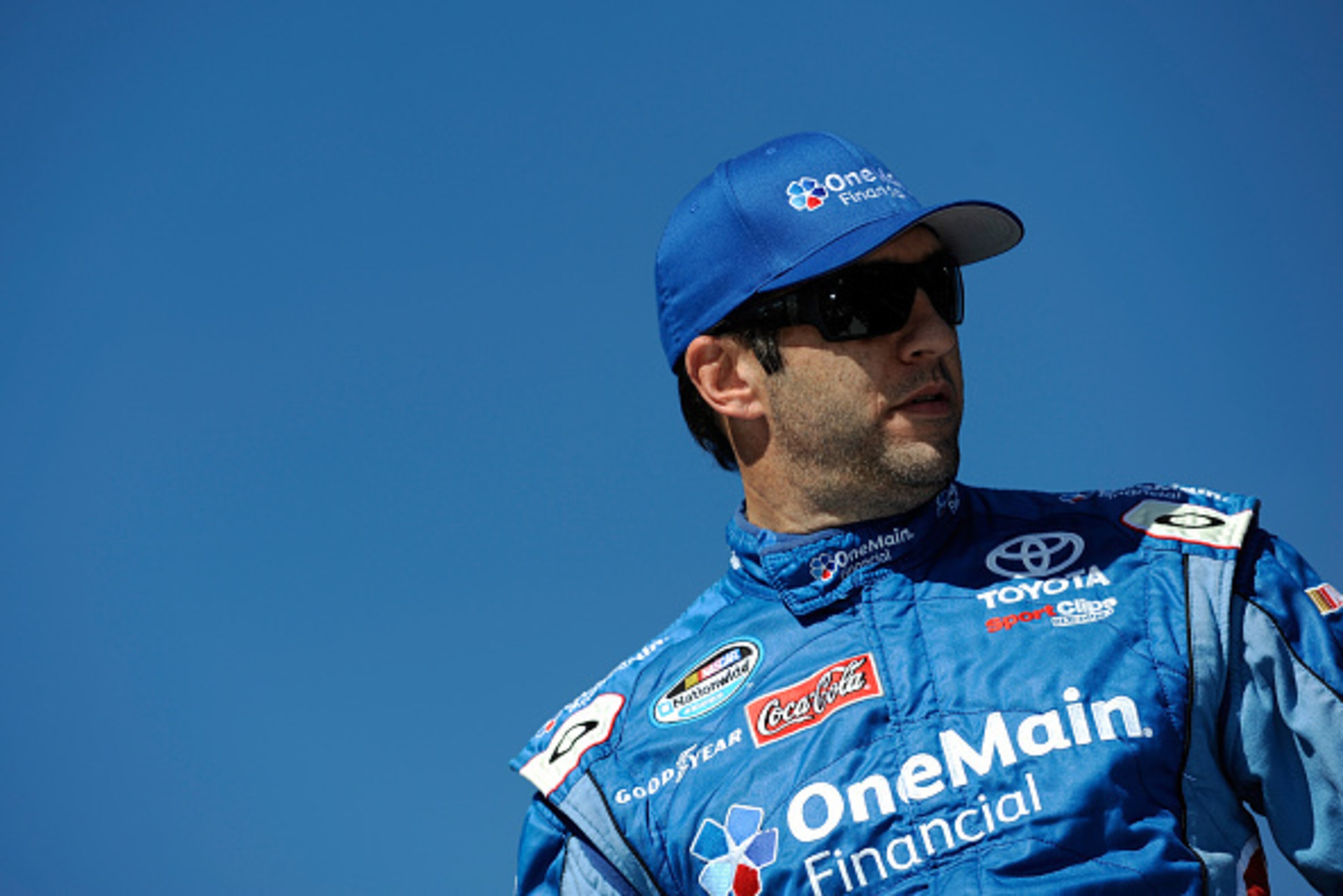 KANSAS CITY, KS - OCTOBER 04:  Elliott Sadler, driver of the #11 OneMain Financial Toyota, looks on before the NASCAR Nationwide Series Kansas Lottery 300 at Kansas Speedway on October 4, 2014 in Kansas City, Kansas.  (Photo by Jared C. Tilton/Getty Image