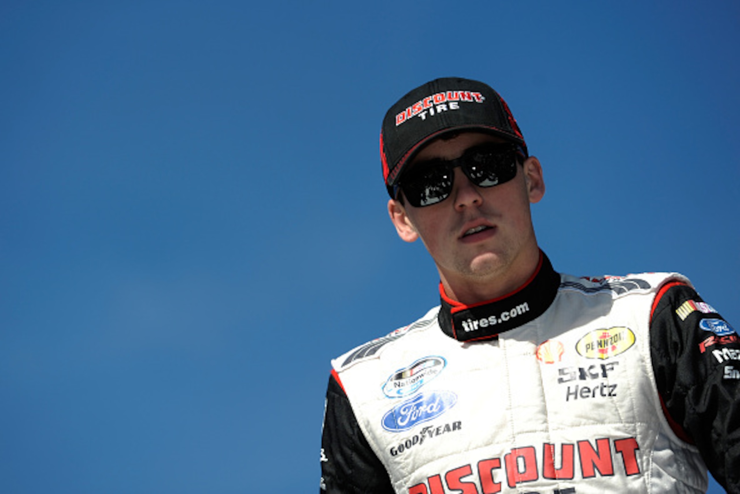 KANSAS CITY, KS - OCTOBER 04: Ryan Blaney, driver of the #22 Discount Tire Ford, looks on before the NASCAR Nationwide Series Kansas Lottery 300 at Kansas Speedway on October 4, 2014 in Kansas City, Kansas. (Photo by Jared C. Tilton/Getty Images) KANSAS CITY, KS - OCTOBER 04: Ryan Blaney, driver of the #22 Discount Tire Ford, looks on before the NASCAR Nationwide Series Kansas Lottery 300 at Kansas Speedway on October 4, 2014 in Kansas City, Kansas. (Photo by Jared C. Tilton/Getty Images)