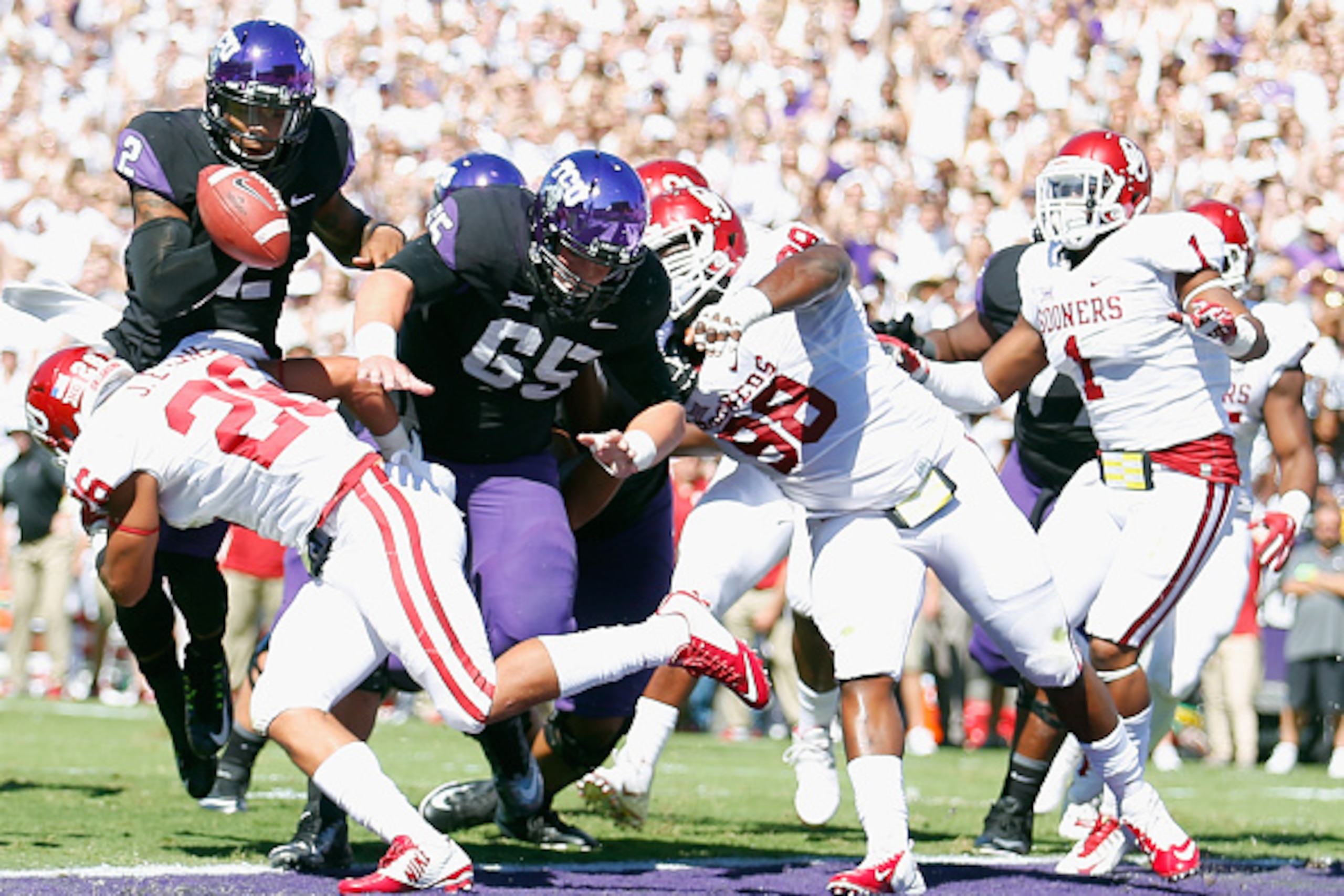 FORT WORTH, TX - OCTOBER 04: Quarterback Trevone Boykin #2 of the TCU Horned Frogs fumbles the ball at the goal line against the Oklahoma Sooners in the first half at Amon G. Carter Stadium on October 4, 2014 in Fort Worth, Texas. (Photo by Tom Penningt FORT WORTH, TX - OCTOBER 04: Quarterback Trevone Boykin #2 of the TCU Horned Frogs fumbles the ball at the goal line against the Oklahoma Sooners in the first half at Amon G. Carter Stadium on October 4, 2014 in Fort Worth, Texas. (Photo by Tom Penningt