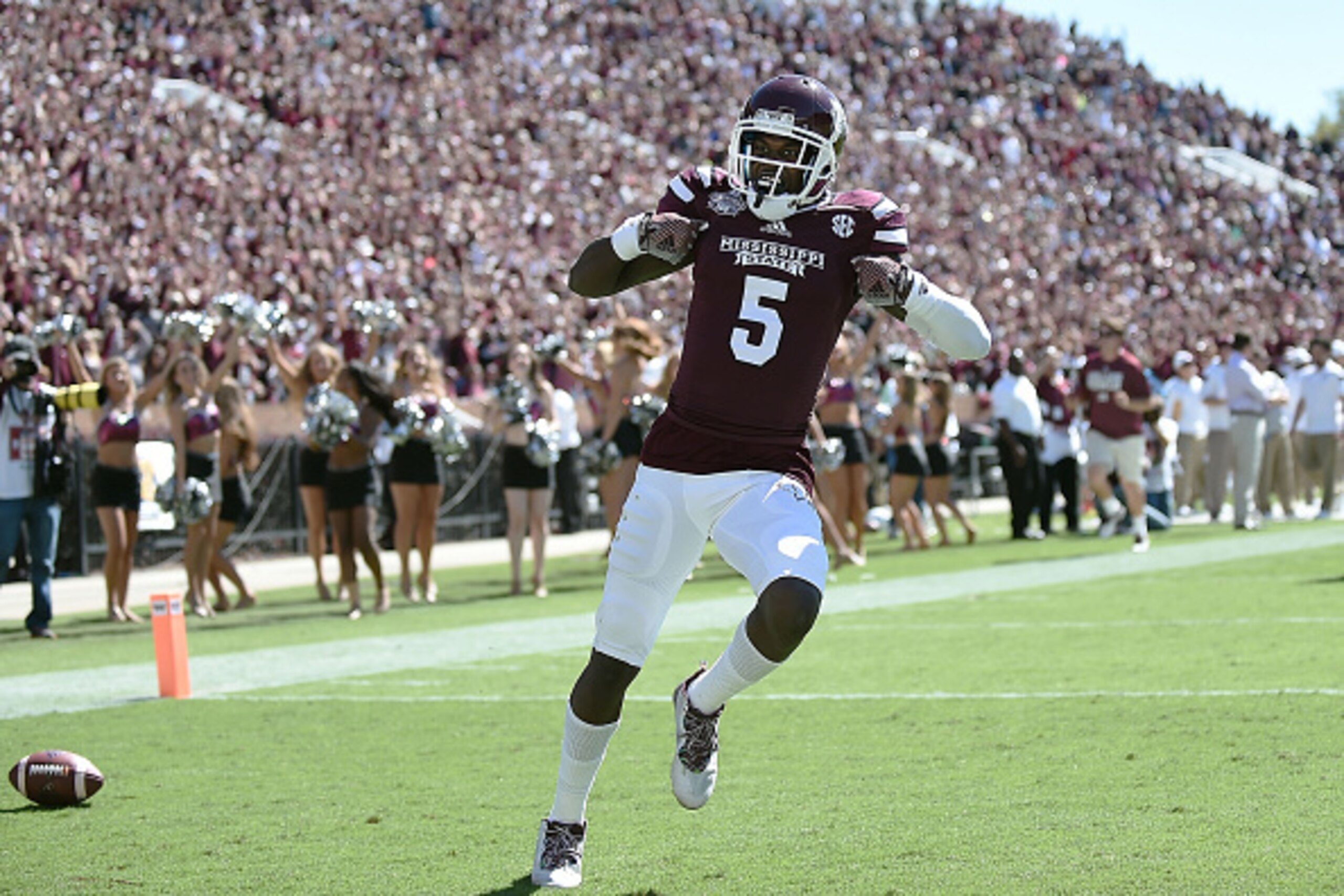 STARKVILLE, MS - OCTOBER 04:  Fred Brown #5 of the Mississippi State Bulldogs celebrates a touchdown against the Texas A&M Aggies during the third quarter of a game at Davis Wade Stadium on October 4, 2014 in Starkville, Mississippi.  Mississippi State wo