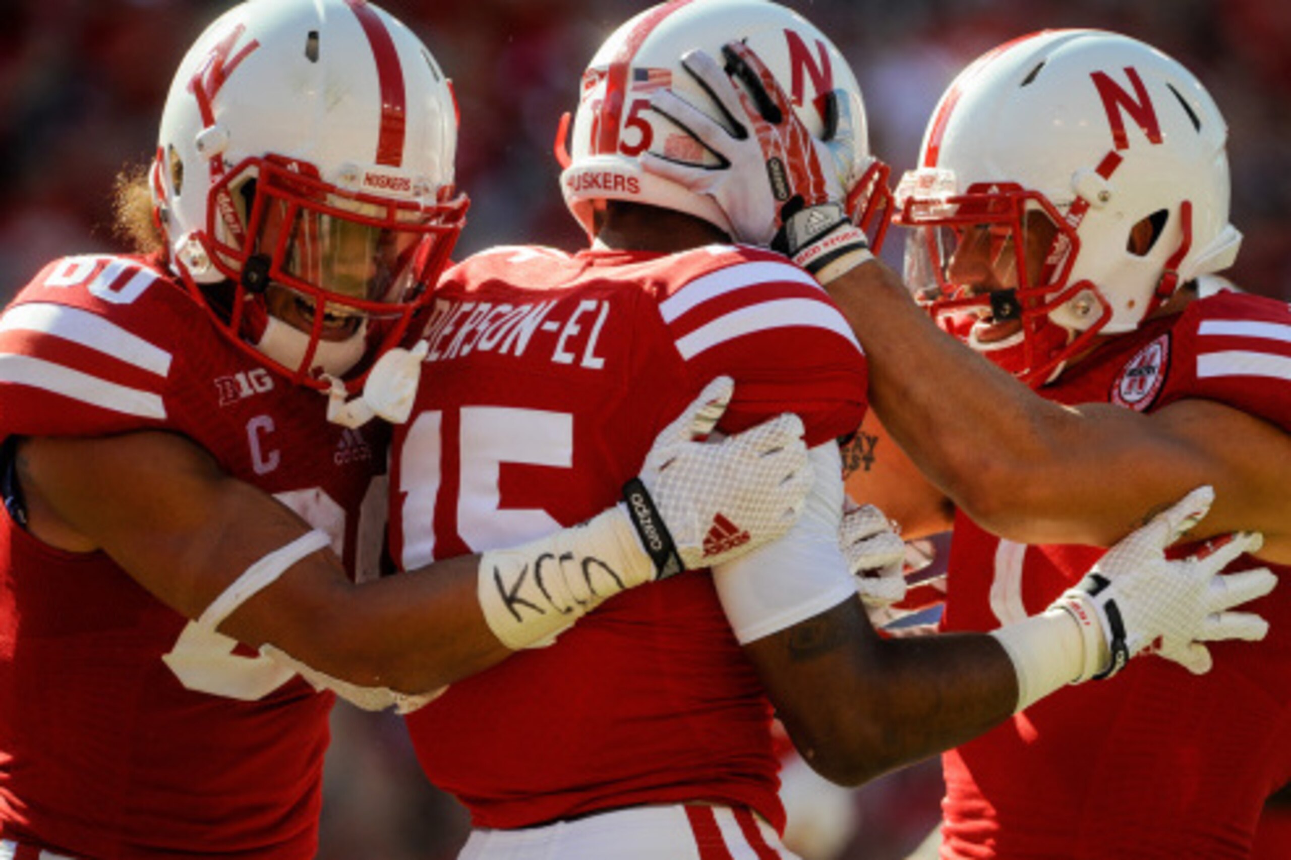 LINCOLN, NE - AUGUST 30: Wide receivers De'Mornay Pierson-El #15, wide receiver Jordan Westerkamp #1, and wide receiver Kenny Bell #80 of the Nebraska Cornhuskers celebrate a touchdown during their game against the Florida Atlantic Owls at Memorial Stadiu