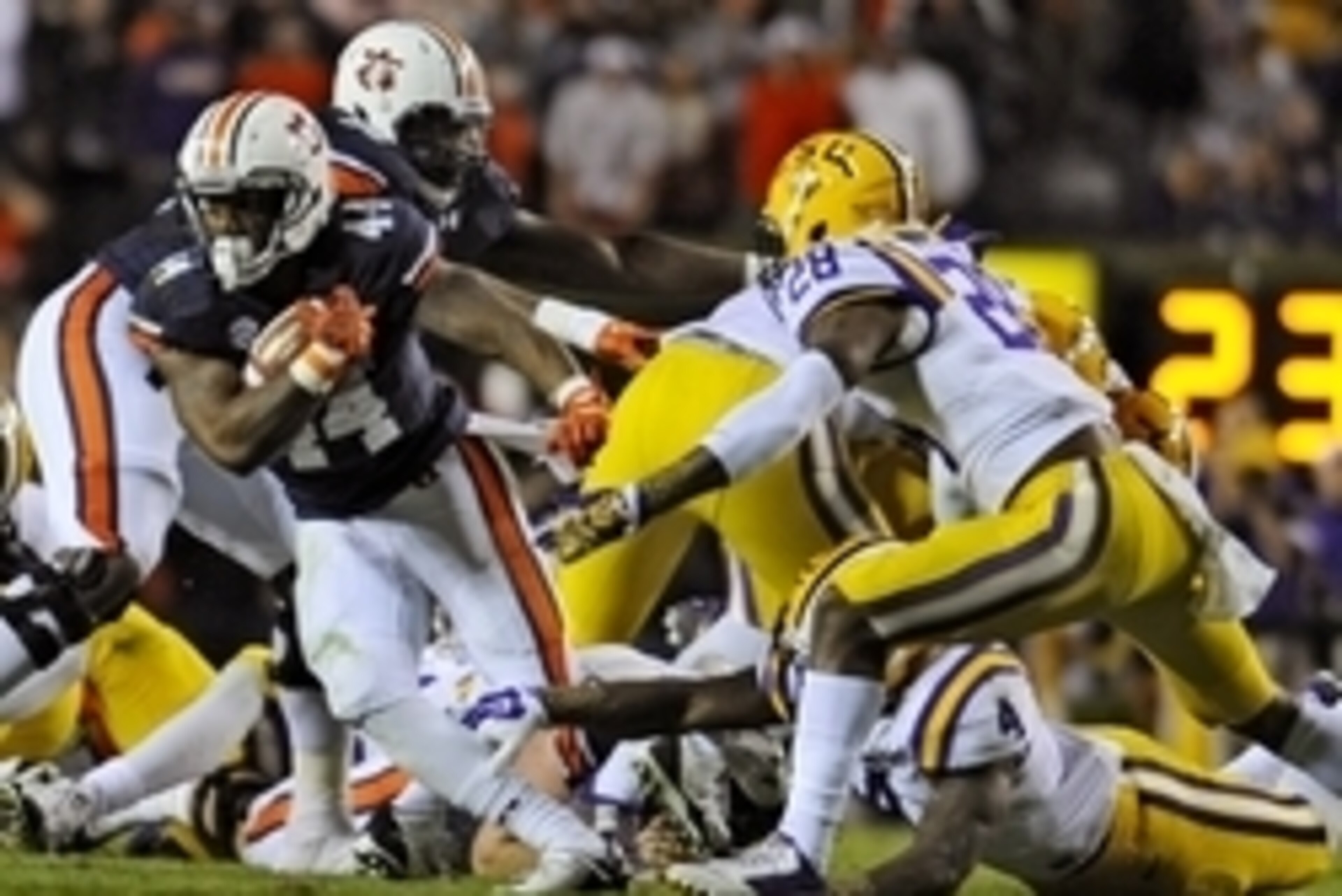 Oct 4, 2014; Auburn, AL, USA; Auburn Tigers running back Cameron Artis-Payne (44) runs the ball past LSU Tigers safety Jalen Mills (28) during the second quarter at Jordan Hare Stadium. Mandatory Credit: Shanna Lockwood-USA TODAY Sports Oct 4, 2014; Auburn, AL, USA; Auburn Tigers running back Cameron Artis-Payne (44) runs the ball past LSU Tigers safety Jalen Mills (28) during the second quarter at Jordan Hare Stadium. Mandatory Credit: Shanna Lockwood-USA TODAY Sports