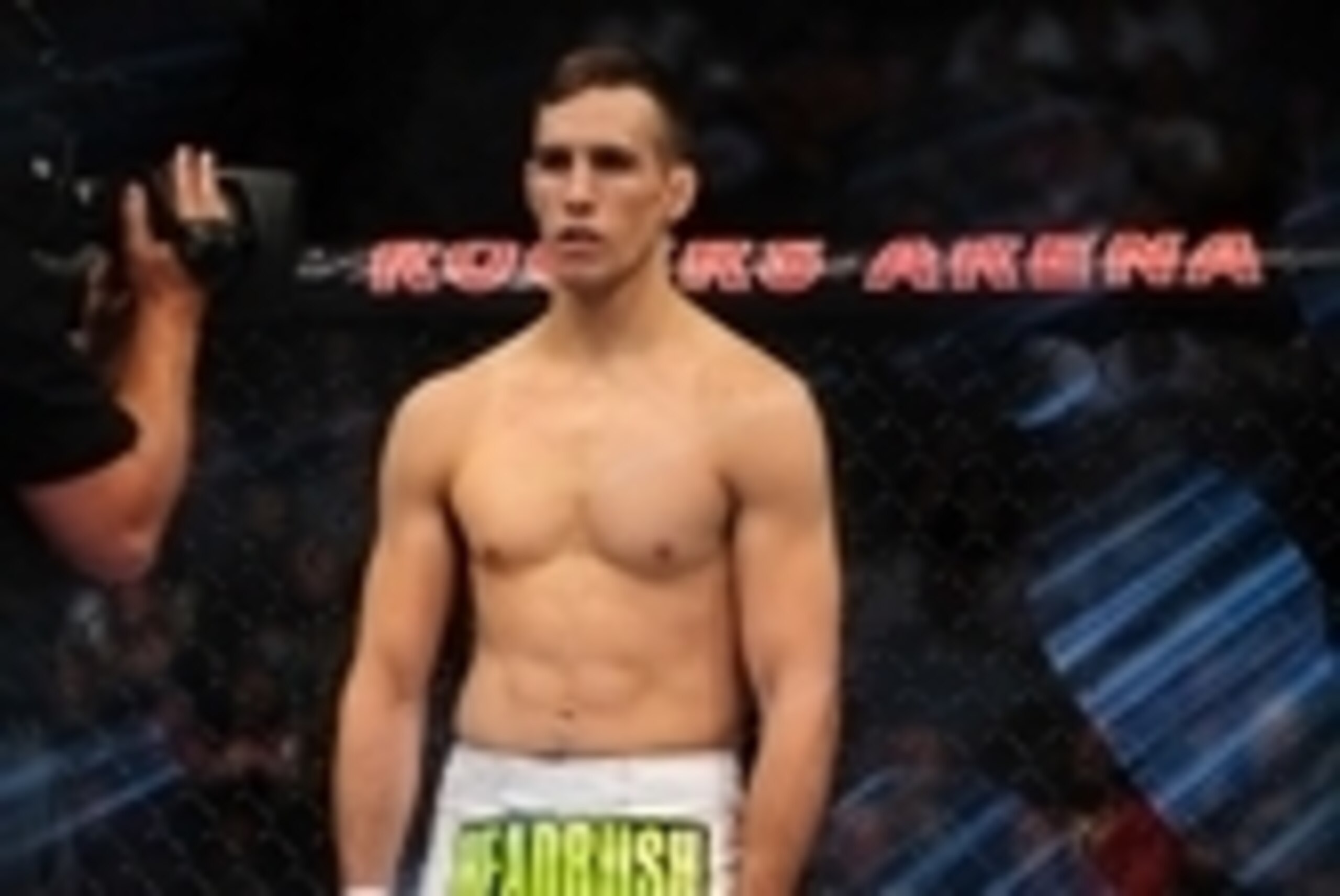 Jun 14, 2014; Vancouver, British Columbia, Canada; Rory MacDonald (red) stands before the fight against Tyron Woodley (blue) during the Welterweigtht bout at UFC 174 at Rogers Arena. Rory MacDonald defeats Tyron Woodley  via unanimous decision. Mandatory 