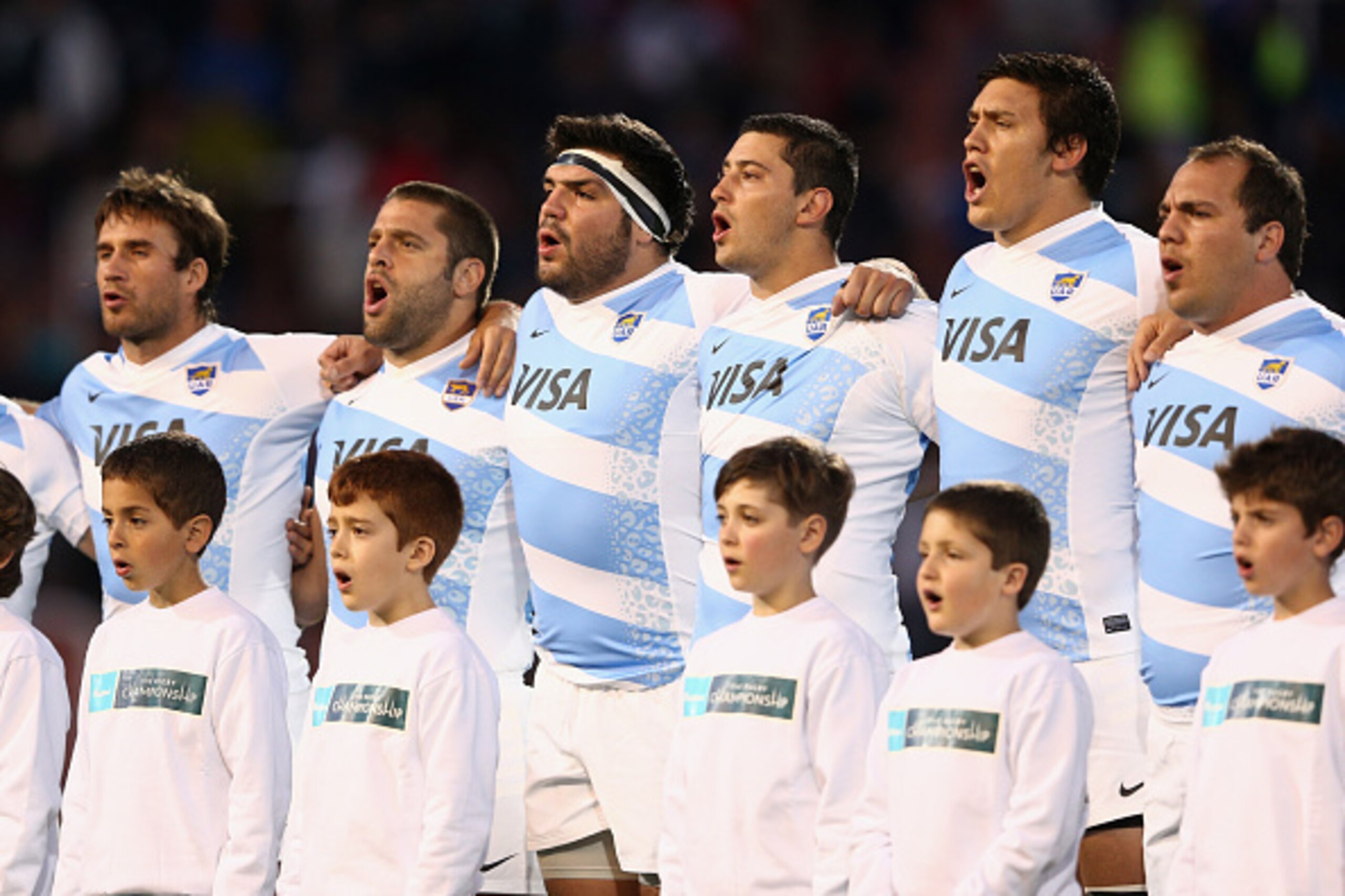 MENDOZA, ARGENTINA - OCTOBER 04: The Pumas sing the Argentinian national anthem during The Rugby Championship match between Argentina and the Australian Wallabies at Estadio Malvinas Argentinas on October 4, 2014 in Mendoza, Argentina.  (Photo by Cameron 