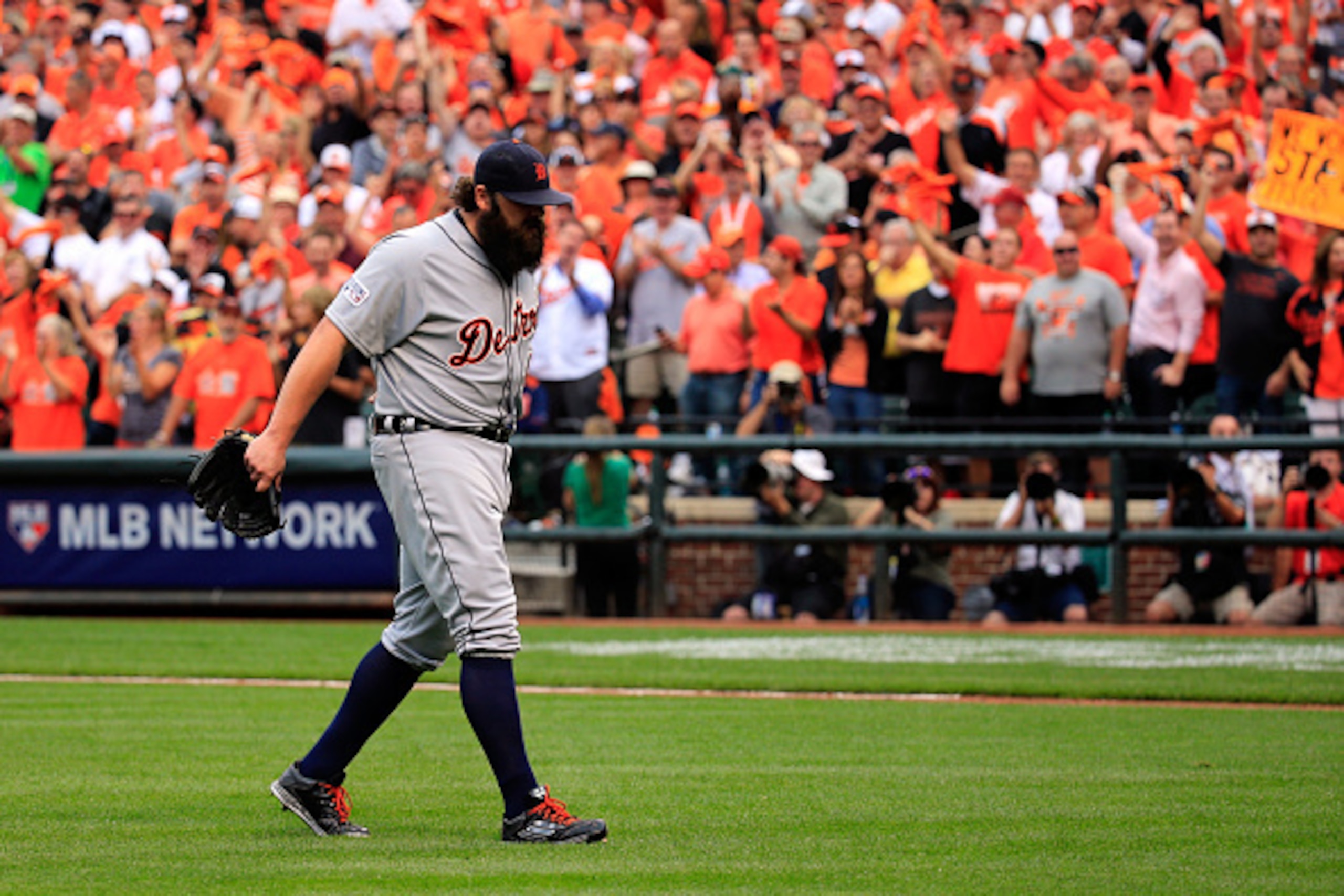 BALTIMORE, MD - OCTOBER 03:  Joba Chamberlain #44 of the Detroit Tigers walks to the dugout after giving up a run in the eighth inning against the Baltimore Orioles during Game Two of the American League Division Series at Oriole Park at Camden Yards on O