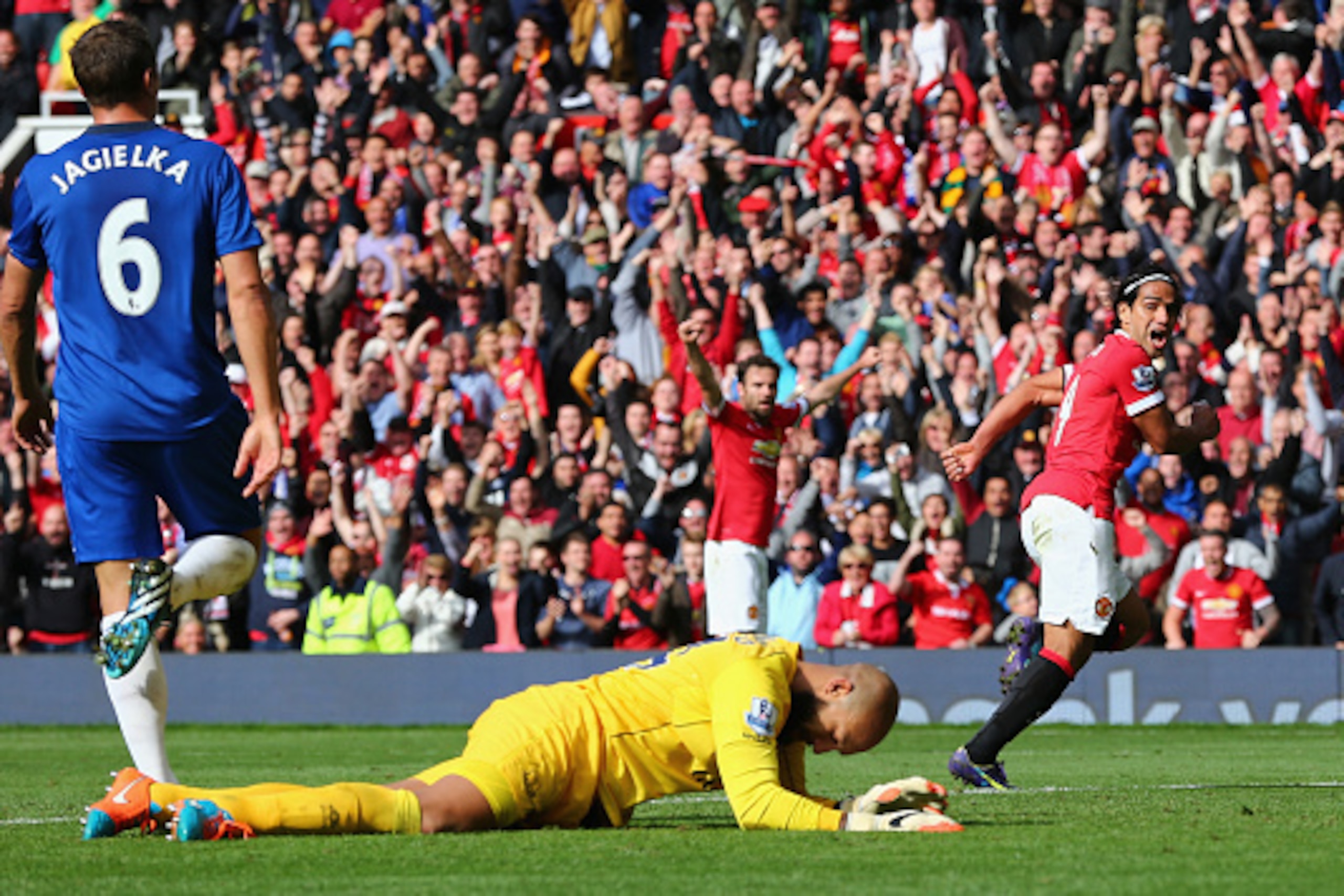 MANCHESTER, ENGLAND - OCTOBER 05:  Radamel Falcao of Manchester United celebrates scoring his team's second goal during the Barclays Premier League match between Manchester United and Everton at Old Trafford on October 5, 2014 in Manchester, England.  (Ph