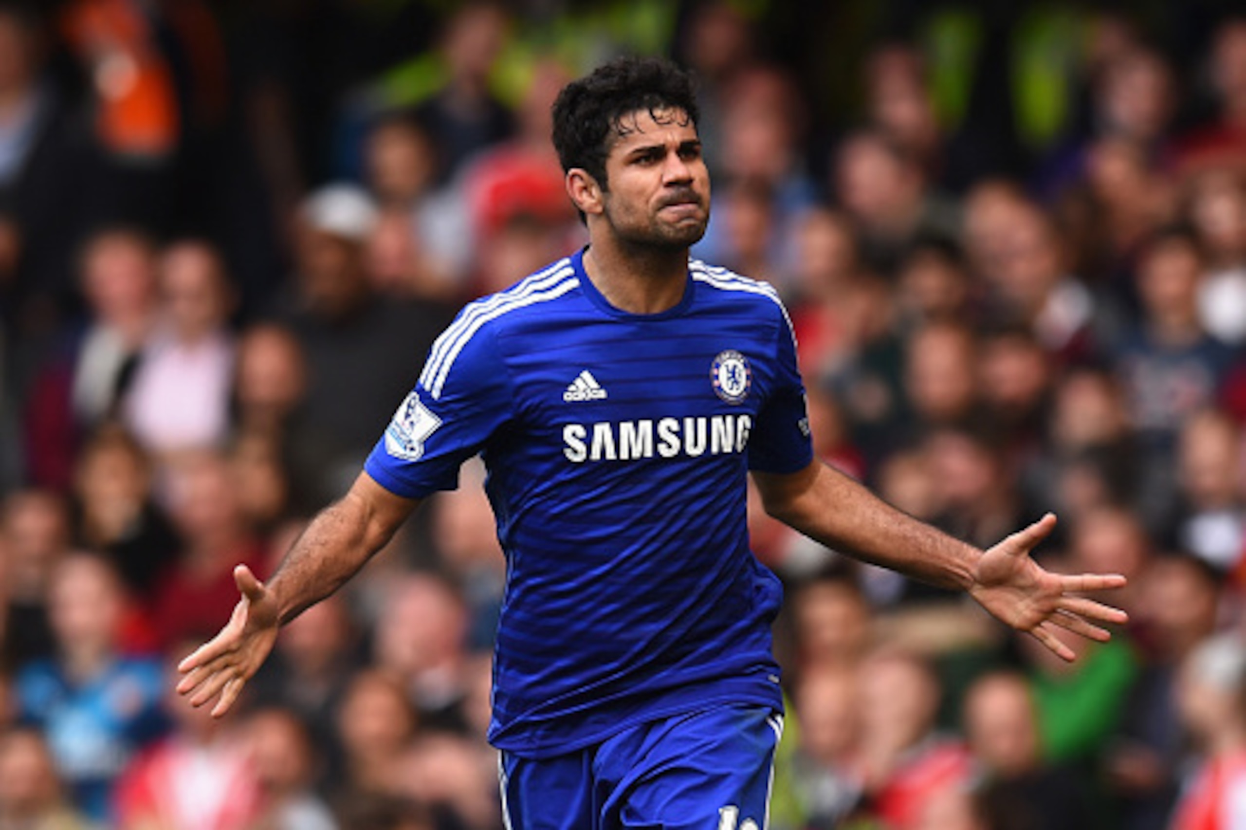 LONDON, ENGLAND - OCTOBER 05:  Diego Costa of Chelsea celebrates scoring their second goalduring the Barclays Premier League match between Chelsea and Arsenal at Stamford Bridge on October 4, 2014 in London, England.  (Photo by Shaun Botterill/Getty Image