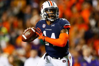 AUBURN, AL - OCTOBER 04:  Nick Marshall #14 of the Auburn Tigers rolls out of the pocket against the LSU Tigers at Jordan Hare Stadium on October 4, 2014 in Auburn, Alabama.  (Photo by Kevin C. Cox/Getty Images)