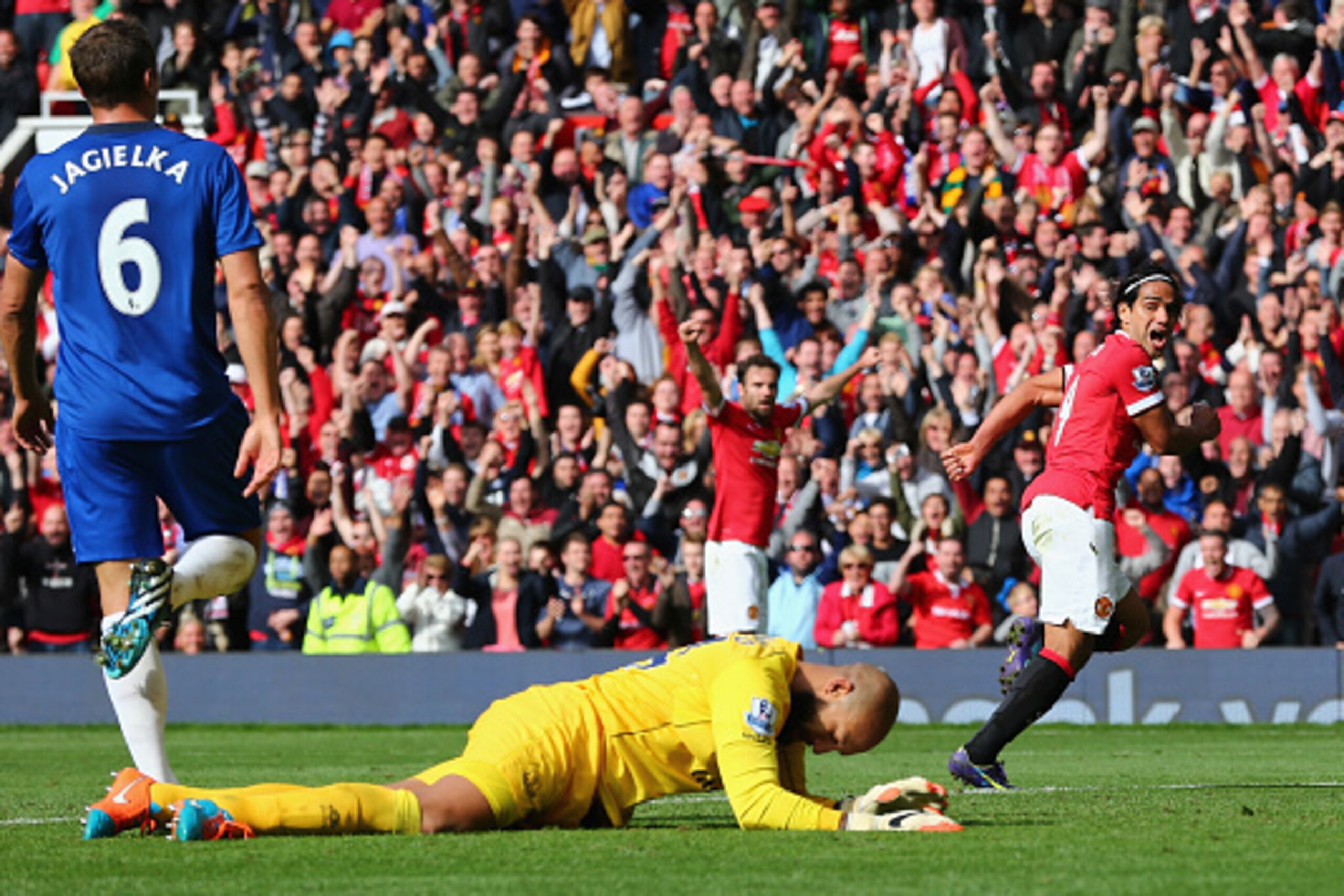 MANCHESTER, ENGLAND - OCTOBER 05:  Radamel Falcao of Manchester United celebrates scoring his team's second goal during the Barclays Premier League match between Manchester United and Everton at Old Trafford on October 5, 2014 in Manchester, England.  (Ph