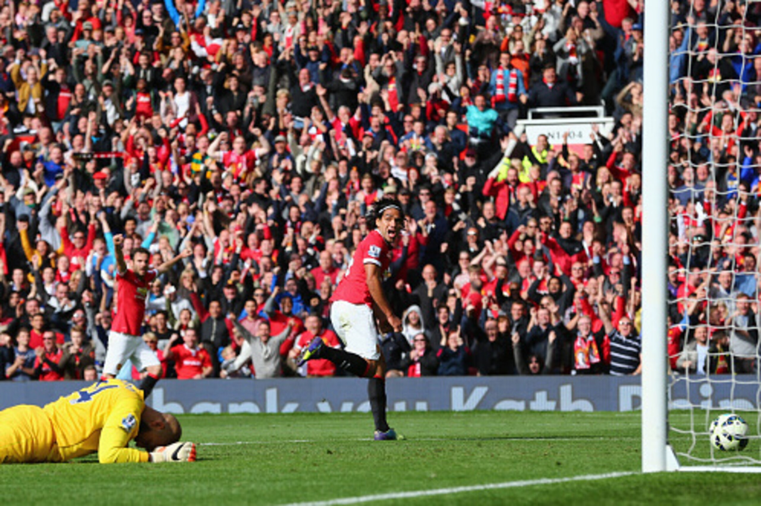 MANCHESTER, ENGLAND - OCTOBER 05:  Radamel Falcao of Manchester United celebrates scoring his team's second goal during the Barclays Premier League match between Manchester United and Everton at Old Trafford on October 5, 2014 in Manchester, England.  (Ph