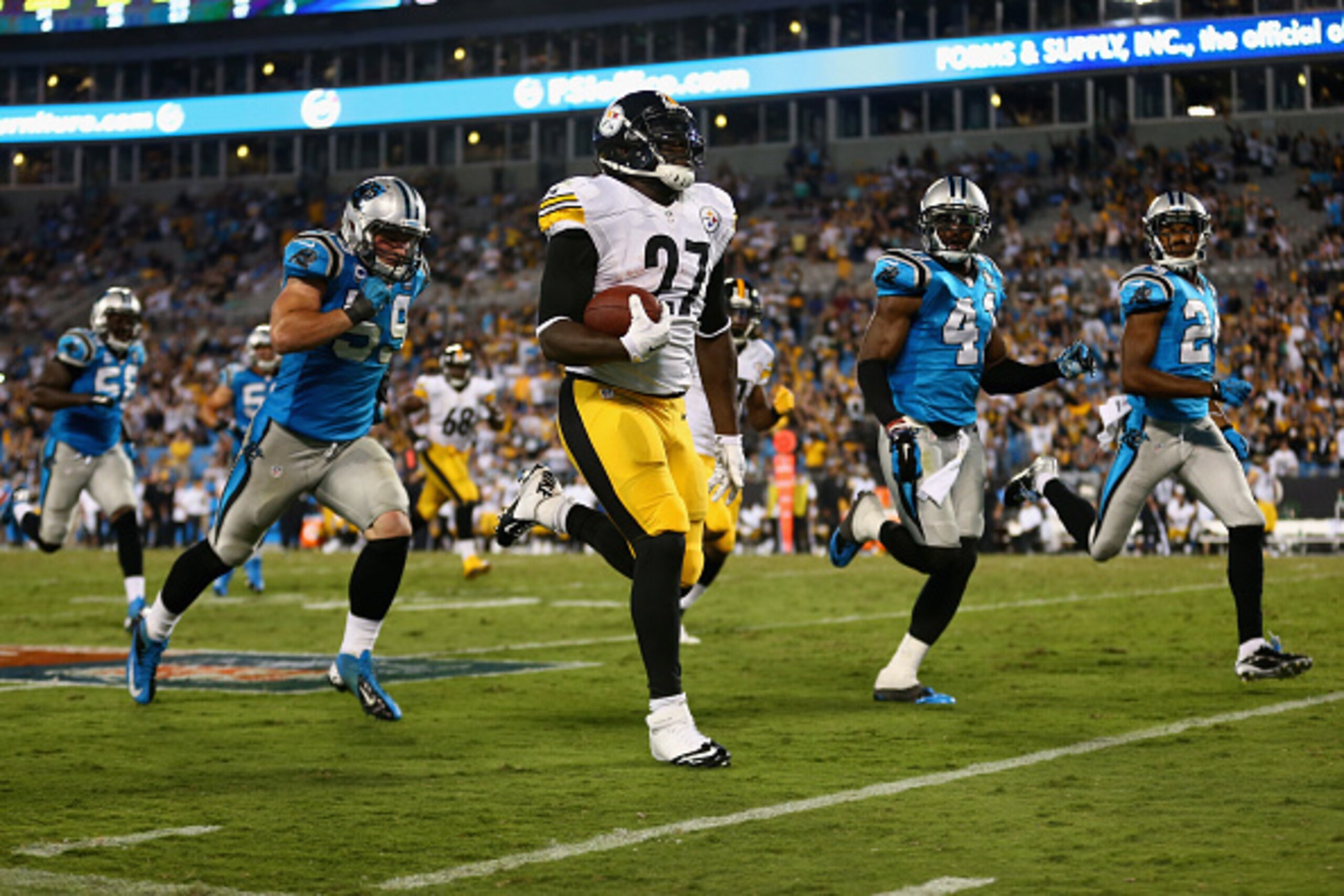 CHARLOTTE, NC - SEPTEMBER 21:   LeGarrette Blount #27 of the Pittsburgh Steelers run the ball against the Carolina Panthers in the 4th quarter during the game at Bank of America Stadium on September 21, 2014 in Charlotte, North Carolina.  (Photo by Street