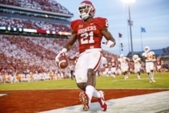 Sep 13, 2014; Norman, OK, USA; Oklahoma Sooners running back Keith Ford (21) scores a touchdown during the game against the Tennessee Volunteers at Gaylord Family - Oklahoma Memorial Stadium. Mandatory Credit: Kevin Jairaj-USA TODAY Sports