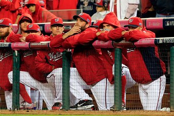WASHINGTON, DC - OCTOBER 04:  The Washington Nationals bench watches the eighteenth inning against the San Francisco Giants during Game Two of the National League Division Series at Nationals Park on October 4, 2014 in Washington, DC.  (Photo by Rob Carr/