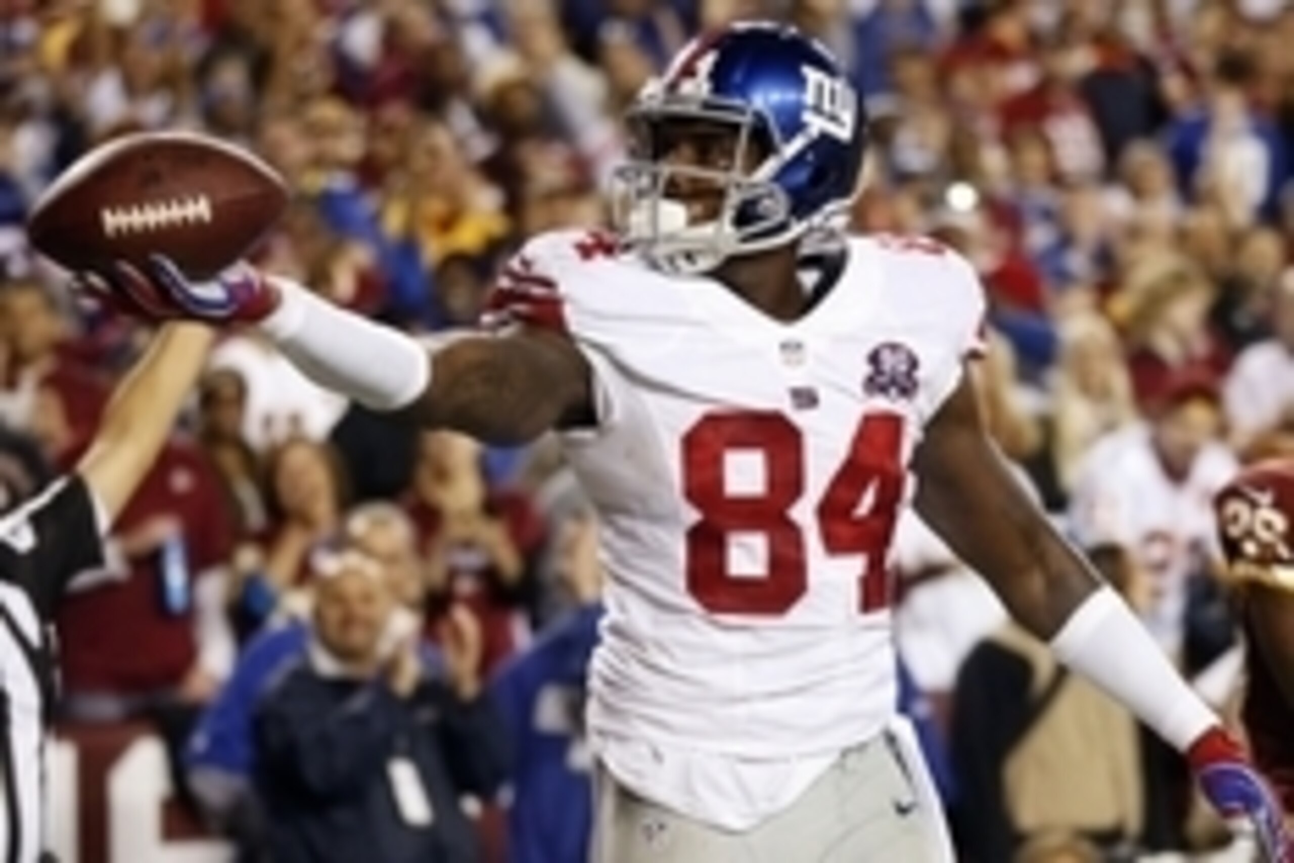 Sep 25, 2014; Landover, MD, USA; New York Giants tight end Larry Donnell (84) celebrates after scoring a touchdown against the Washington Redskins in the second quarter at FedEx Field. Mandatory Credit: Geoff Burke-USA TODAY Sports