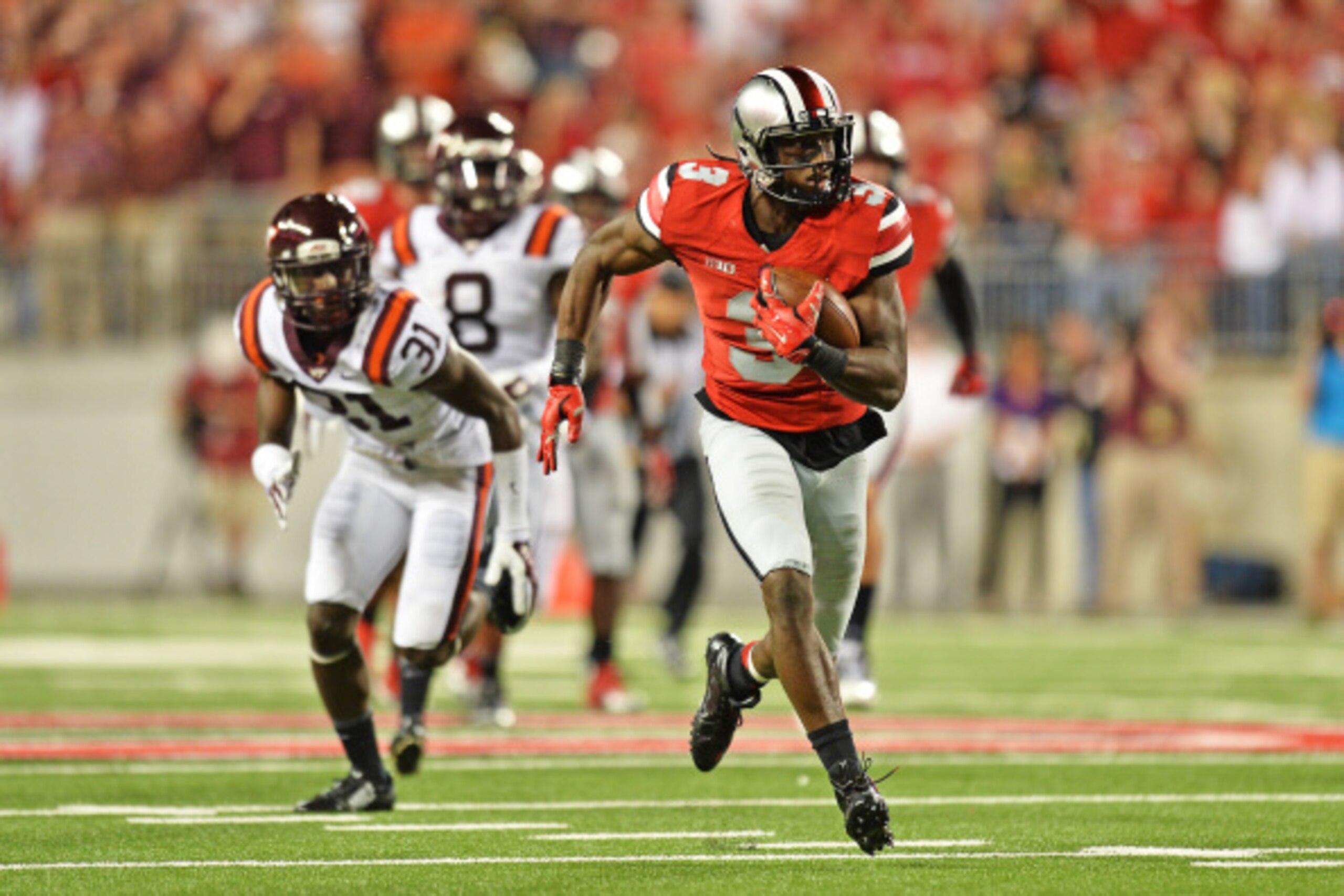COLUMBUS, OH - SEPTEMBER 6:  Michael Thomas #3 of the Ohio State Buckeyes runs upfield to complete a 53-yard reception for a touchdown in the third quarter against the Virginia Tech Hokies at Ohio Stadium on September 6, 2014 in Columbus, Ohio. Virginia T