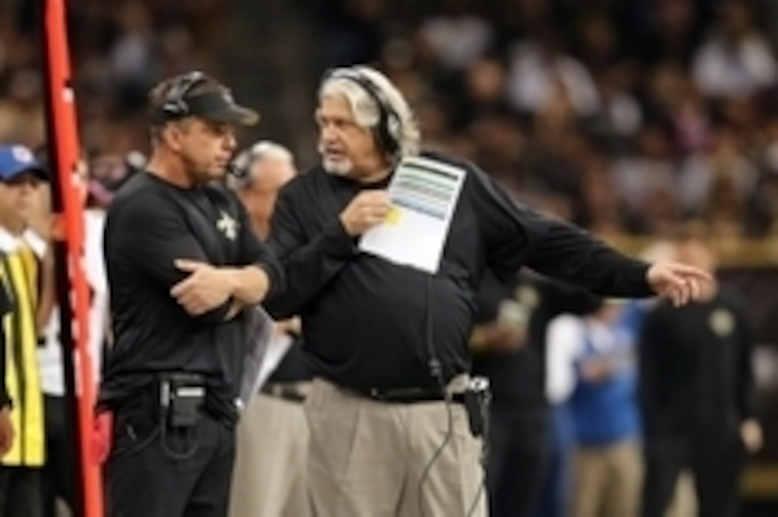Oct 5, 2014; New Orleans, LA, USA; New Orleans Saints head coach Sean Payton and defensive coordinator Rob Ryan talk on the sidelines during their game against the Tampa Bay Buccaneers in the second quarter of their game at the Mercedes-Benz Superdome. Ma