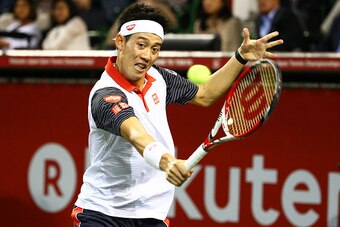 TOKYO, JAPAN - OCTOBER 05: Kei Nishikori of Japan in action during the men's singles final match against  Milos Raonic of Canada on day seven of Rakuten Open 2014 at Ariake Colosseum on October 5, 2014 in Tokyo, Japan.  (Photo by Koji Watanabe/Getty Image