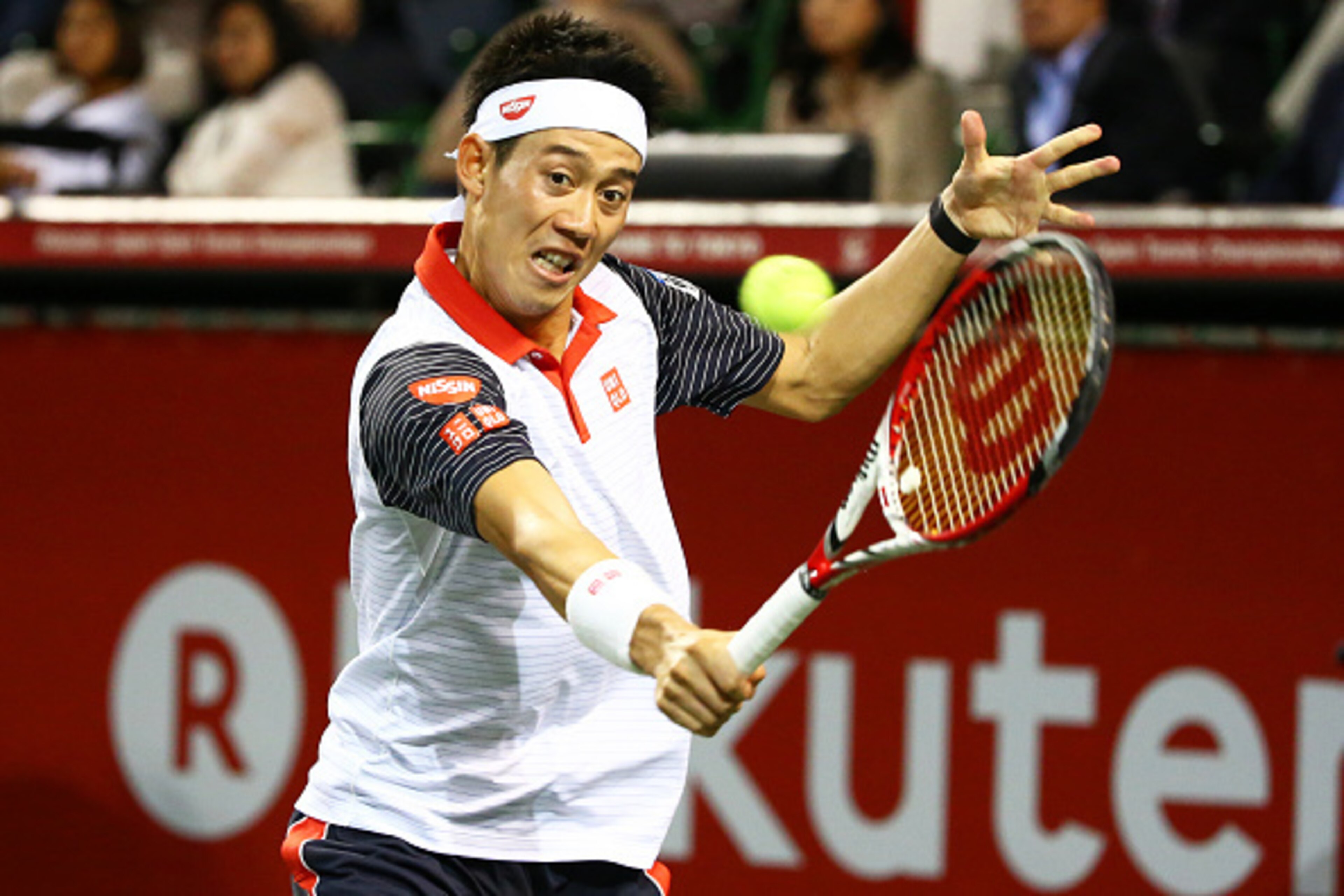 TOKYO, JAPAN - OCTOBER 05: Kei Nishikori of Japan in action during the men's singles final match against  Milos Raonic of Canada on day seven of Rakuten Open 2014 at Ariake Colosseum on October 5, 2014 in Tokyo, Japan.  (Photo by Koji Watanabe/Getty Image