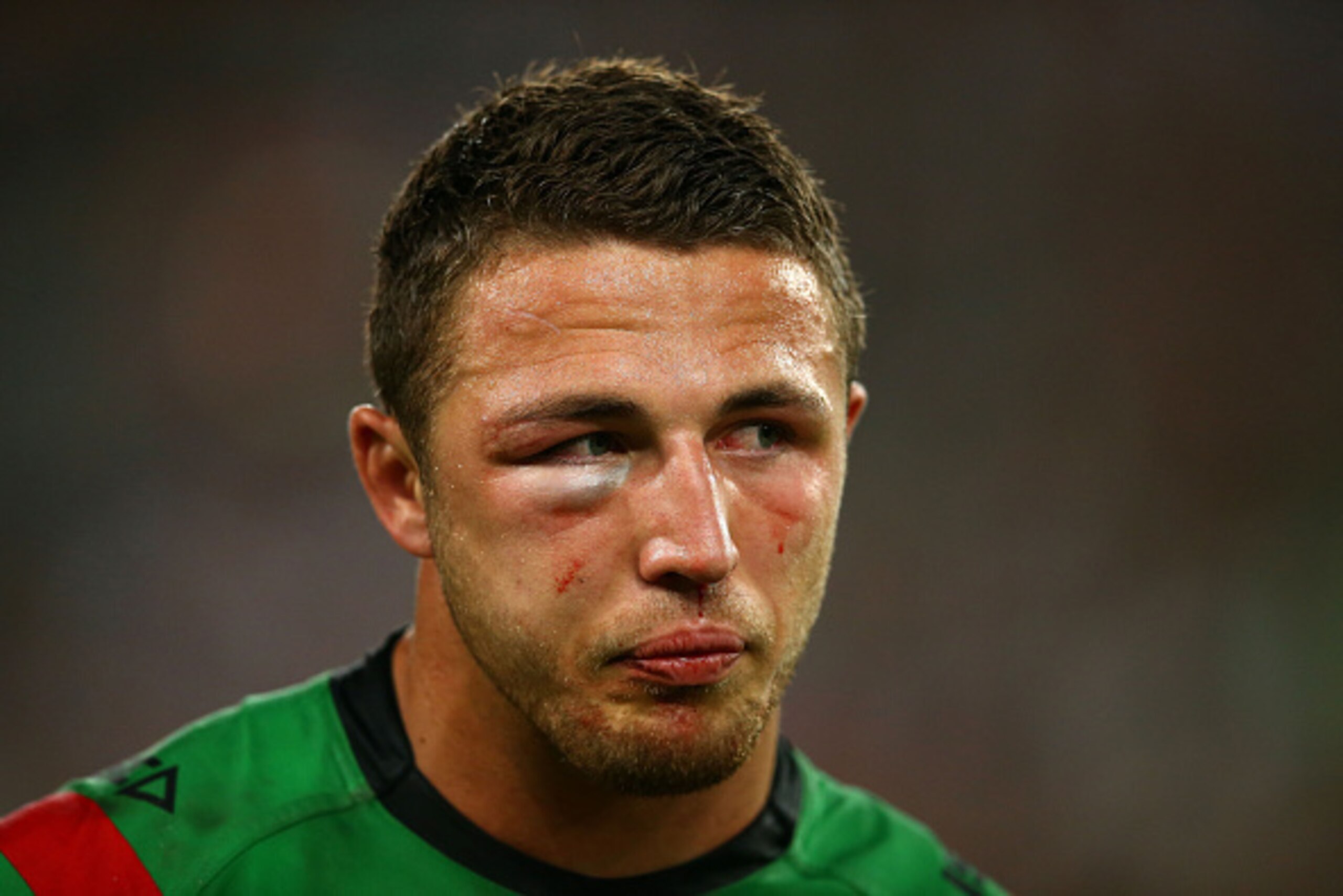 SYDNEY, AUSTRALIA - OCTOBER 05:  Sam Burgess of the Rabbitohs looks on after the 2014 NRL Grand Final match between the South Sydney Rabbitohs and the Canterbury Bulldogs at ANZ Stadium on October 5, 2014 in Sydney, Australia.  (Photo by Mark Kolbe/Getty 