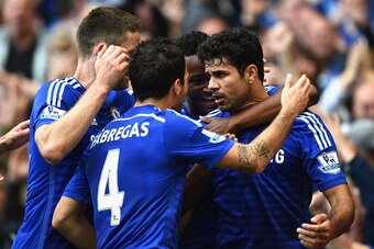 LONDON, ENGLAND - OCTOBER 05:  Diego Costa of Chelsea celebrates scoring their second goal with  Cesc Fabregas of Chelsea during the Barclays Premier League match between Chelsea and Arsenal at Stamford Bridge on October 4, 2014 in London, England.  (Phot