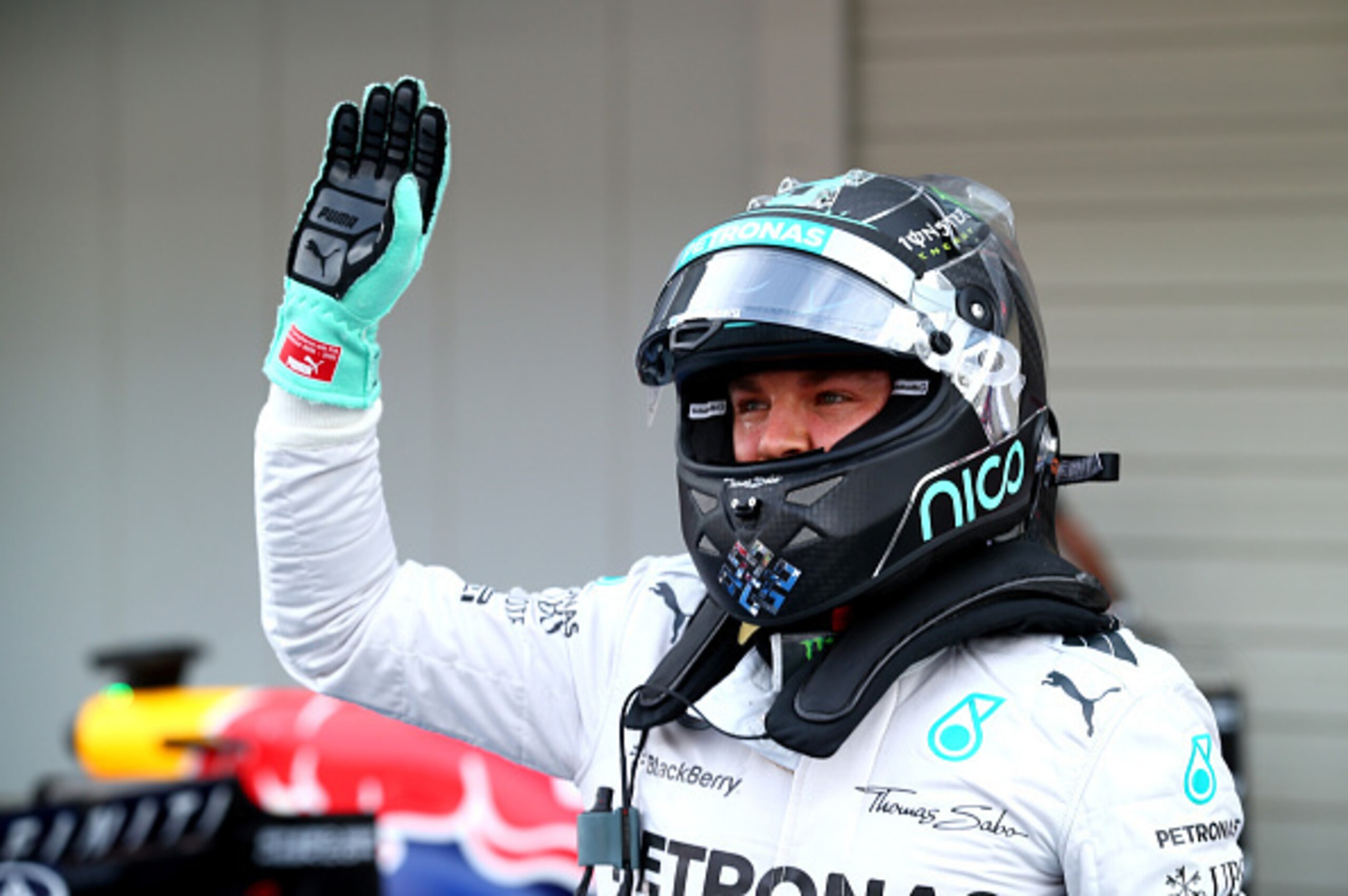 SUZUKA, JAPAN - OCTOBER 04:  Nico Rosberg of Germany and Mercedes GP celebrates after securing pole position during Qualifying for the Japanese Formula One Grand Prix at Suzuka Circuit on October 4, 2014 in Suzuka, Japan.  (Photo by Clive Rose/Getty Image