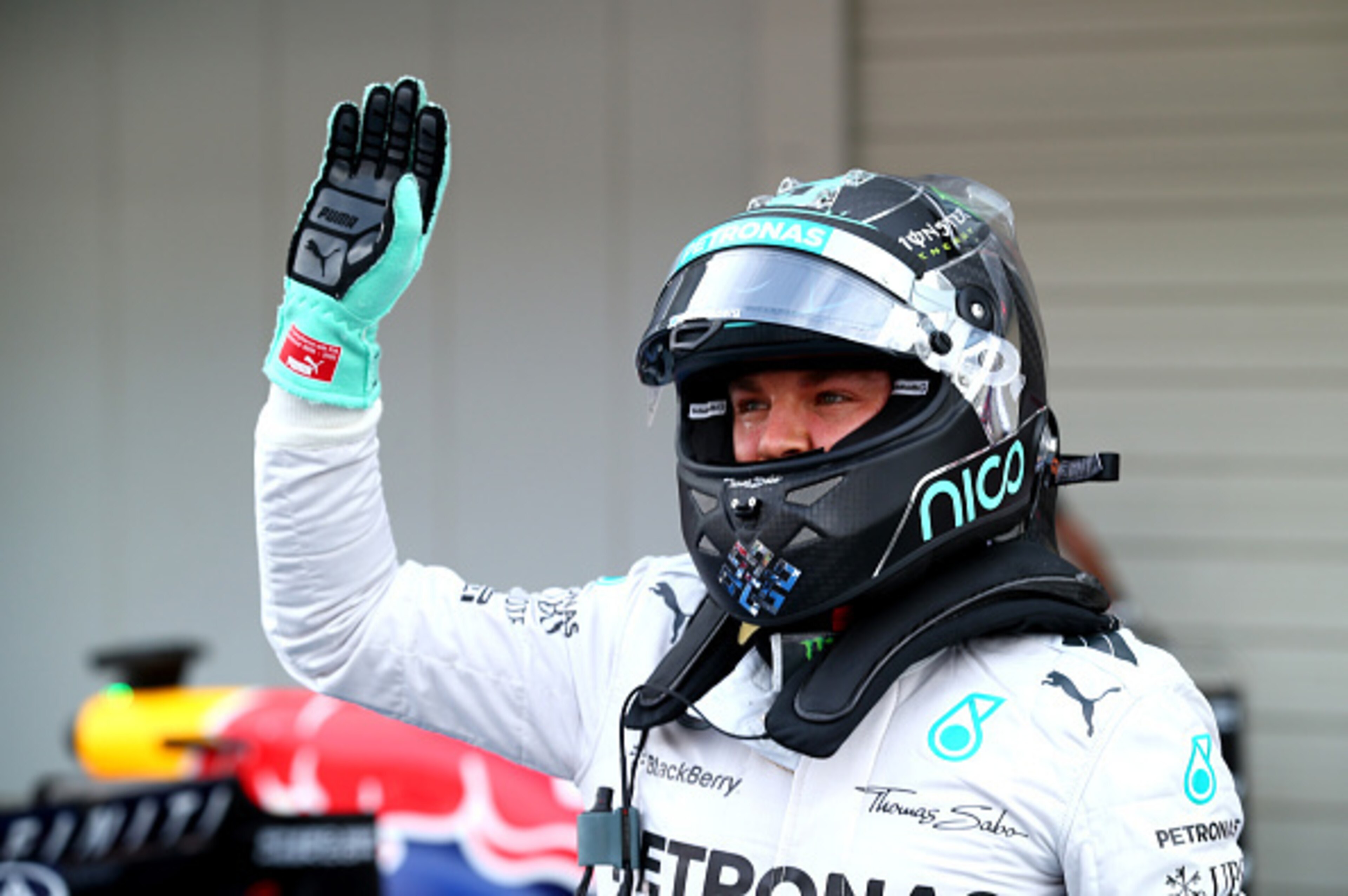 SUZUKA, JAPAN - OCTOBER 04:  Nico Rosberg of Germany and Mercedes GP celebrates after securing pole position during Qualifying for the Japanese Formula One Grand Prix at Suzuka Circuit on October 4, 2014 in Suzuka, Japan.  (Photo by Clive Rose/Getty Image