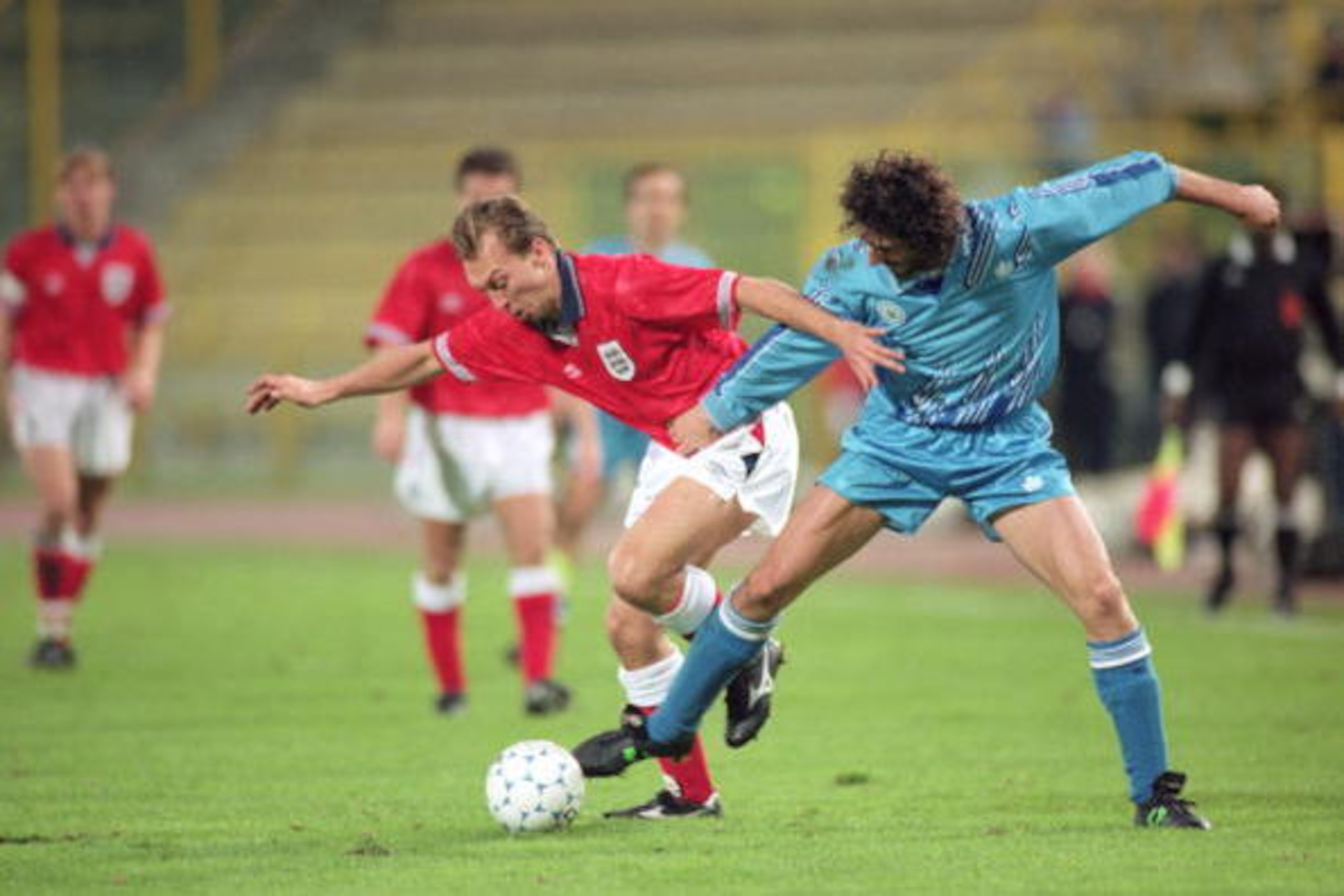 David Platt of England and Zanotti of San Marino during a World Cup qualifier match between San Marino and England, 17th November 1993. England won 1-7. (Photo by Shaun Botterill/Getty Images)