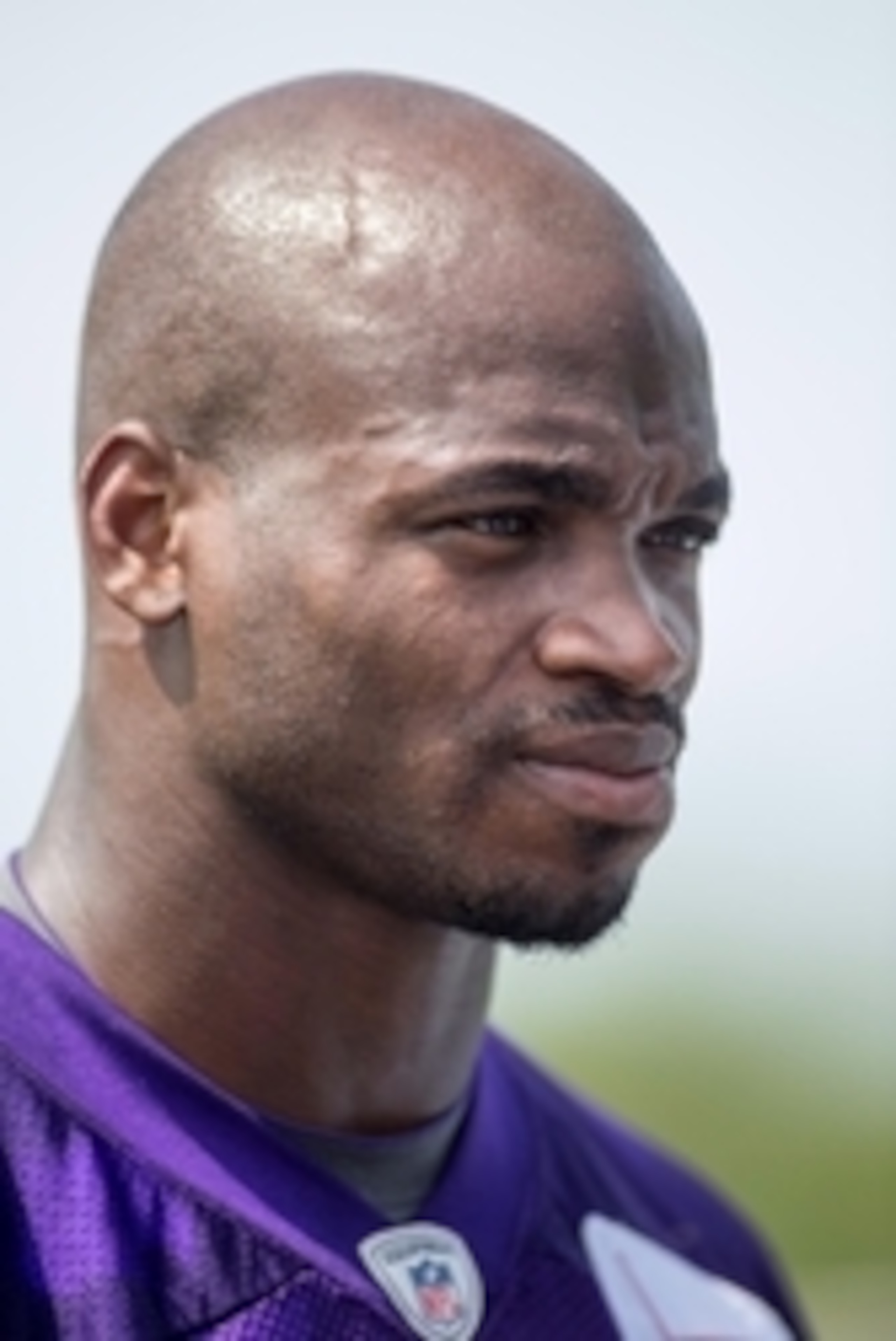 Jun 17, 2014; Eden Prairie, MN, USA; Minnesota Vikings running back Adrian Peterson (28) talks with a reporter after practice at Winter Park. Mandatory Credit: Bruce Kluckhohn-USA TODAY Sports