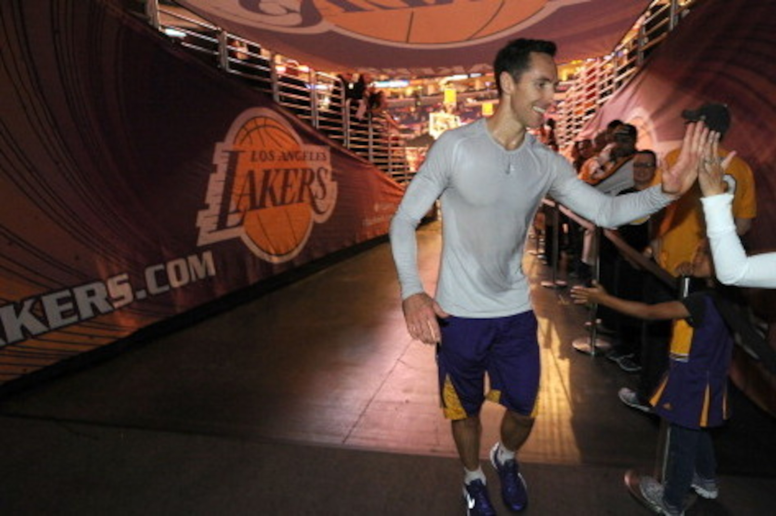 LOS ANGELES, CA - APRIL 13: Steve Nash #10 of the Los Angeles Lakers greets fans before a game against the Memphis Grizzlies at Staples Center on April 13, 2014 in Los Angeles, California. NOTE TO USER: User expressly acknowledges and agrees that, by down