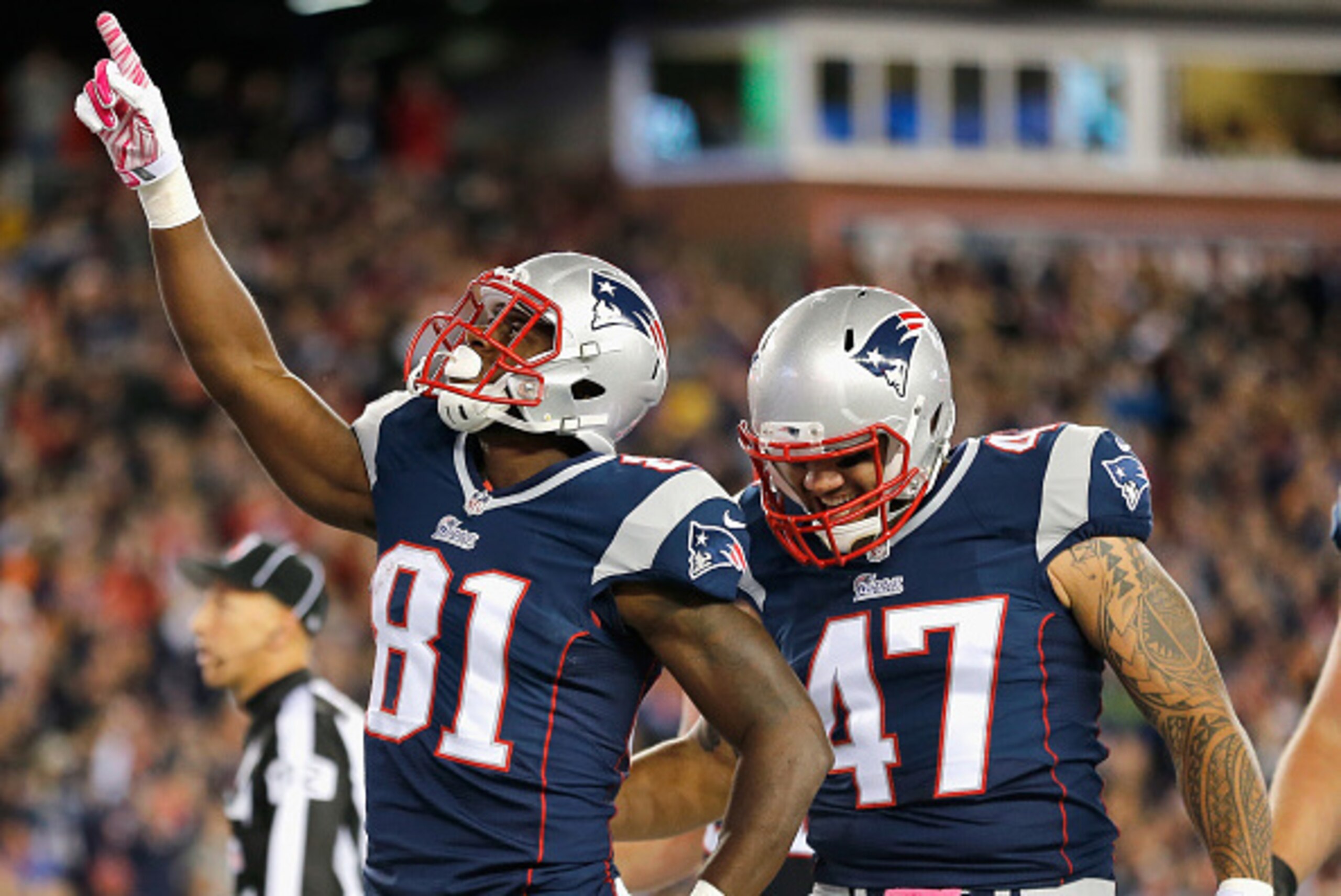 FOXBORO, MA - OCTOBER 05:  Tim Wright #81 of the New England Patriots celebrates after scoring a touchdown alongside Michael Hoomanawanui #47 during the first quarter against the Cincinnati Bengals at Gillette Stadium on October 5, 2014 in Foxboro, Massac