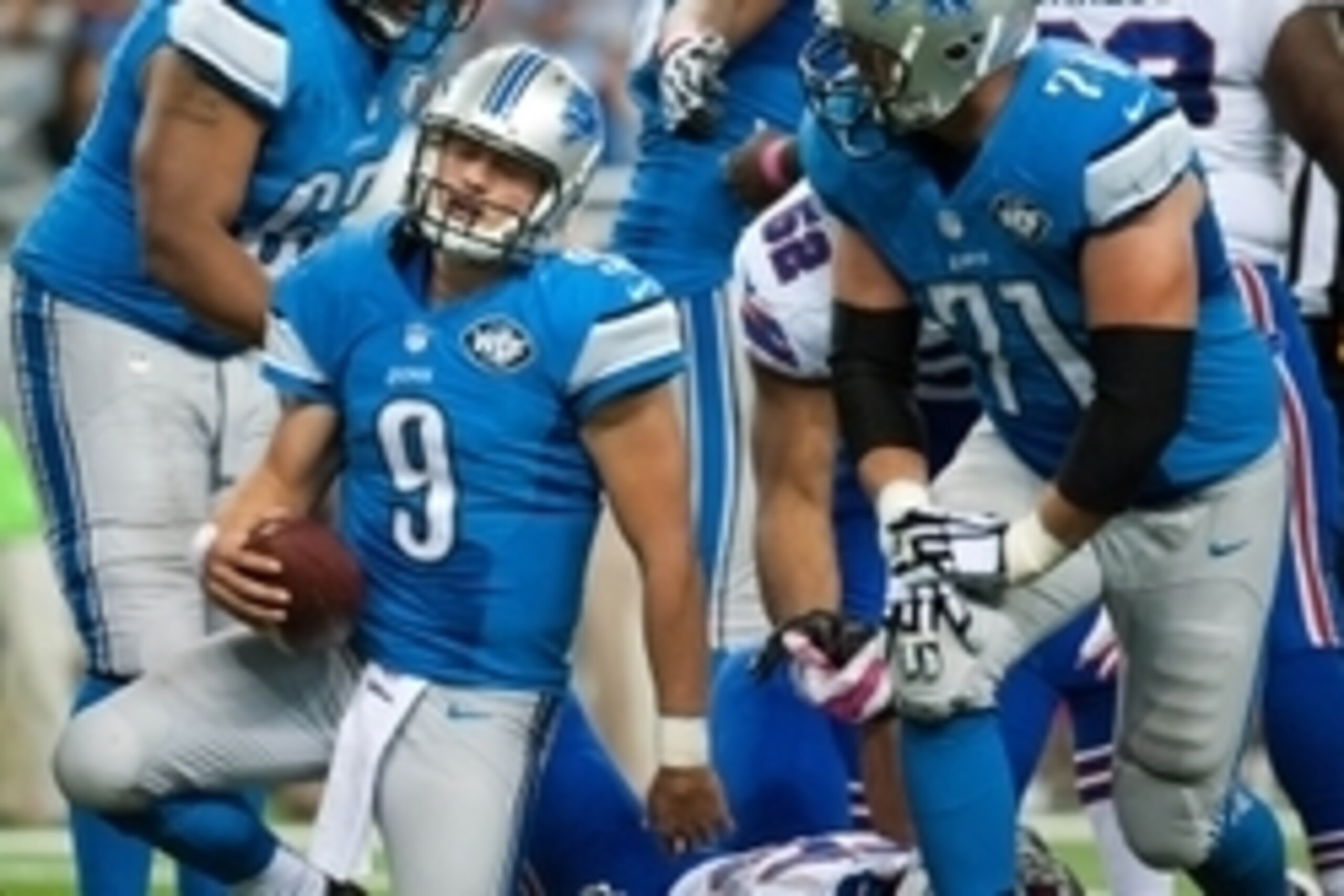 Oct 5, 2014; Detroit, MI, USA; Detroit Lions quarterback Matthew Stafford (9) reacts after being sacked during the fourth quarter against the Buffalo Bills at Ford Field. Buffalo won 17-14. Mandatory Credit: Tim Fuller-USA TODAY Sports