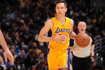LOS ANGELES, CA - APRIL 4: Steve Nash #10 of the Los Angeles Lakers handles the ball against the Dallas Mavericks at Staples Center on April 4, 2014 in Los Angeles, California. NOTE TO USER: User expressly acknowledges and agrees that, by downloading and/