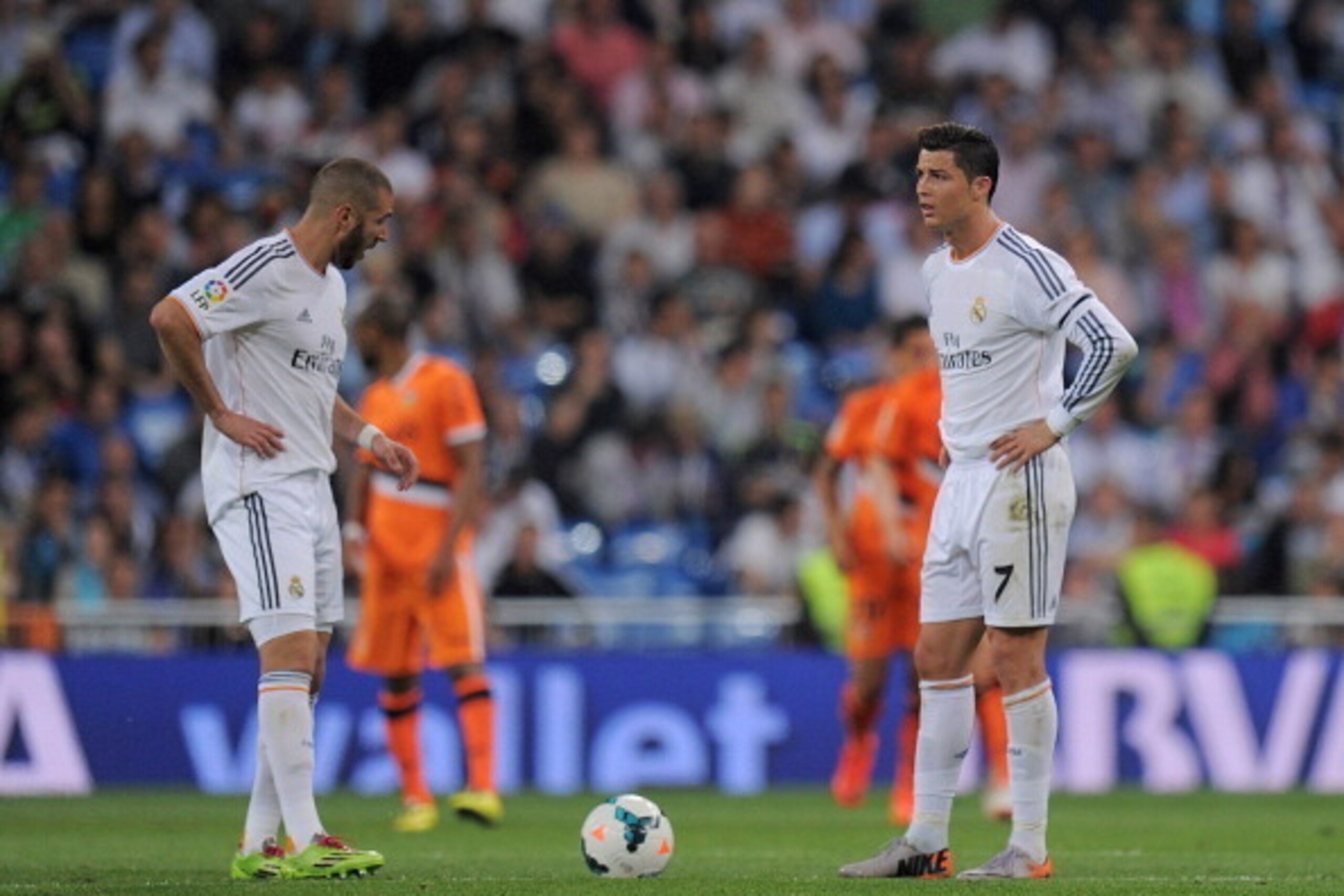 MADRID, SPAIN - MAY 04: Cristiano Ronaldo and Karim Benzema of Real Madrid FC react after Valencia CF scored their 2nd goal during the La Liga match between Real Madrid CF and Valencia CF at Santiago Bernabeu stadium on May 4, 2014 in Madrid, Spain. (Ph MADRID, SPAIN - MAY 04: Cristiano Ronaldo and Karim Benzema of Real Madrid FC react after Valencia CF scored their 2nd goal during the La Liga match between Real Madrid CF and Valencia CF at Santiago Bernabeu stadium on May 4, 2014 in Madrid, Spain. (Ph