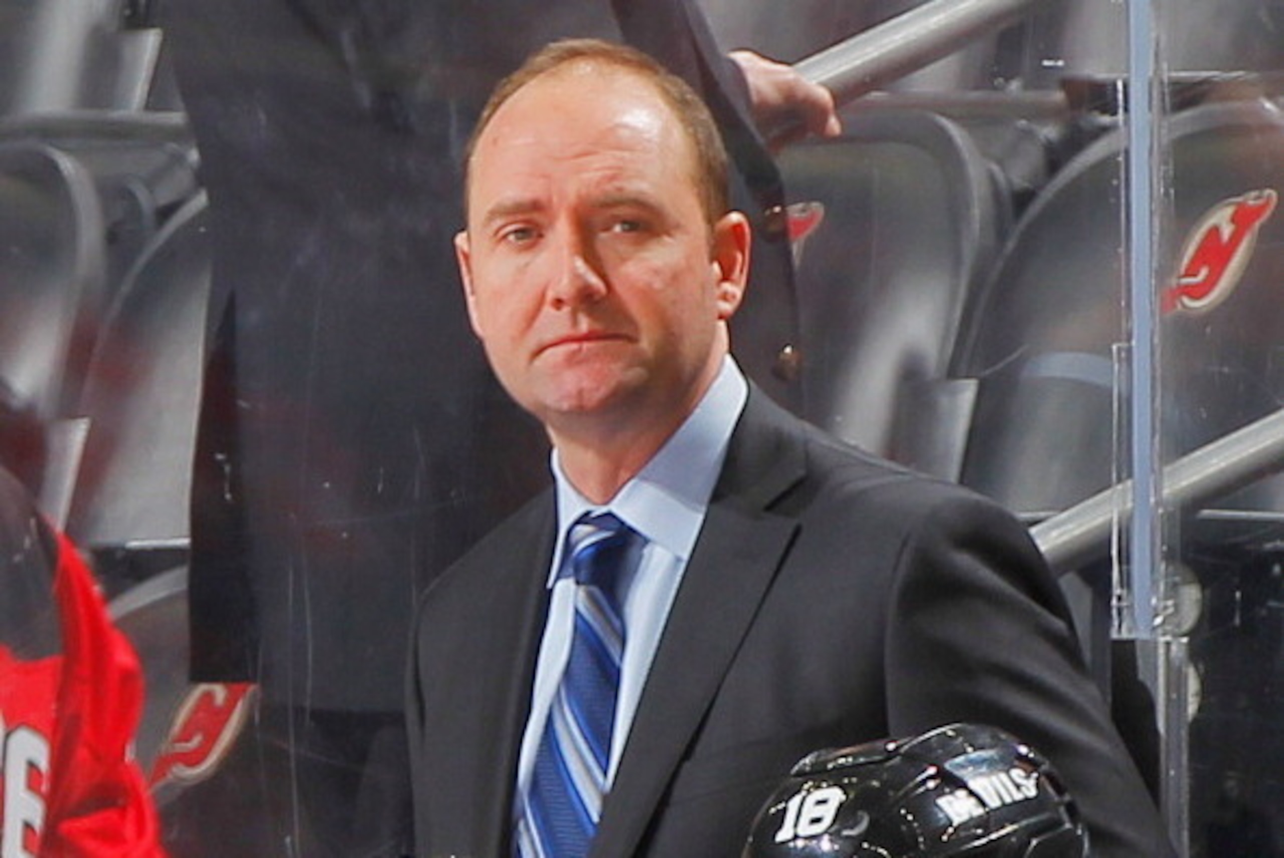 NEWARK, NJ - FEBRUARY 03: Head coach Peter DeBoer of the New Jersey Devils looks on during a first period timeout against the Colorado Avalanche at the Prudential Center on February 3, 2014 in Newark, New Jersey. (Photo by Andy Marlin/NHLI via Getty Image