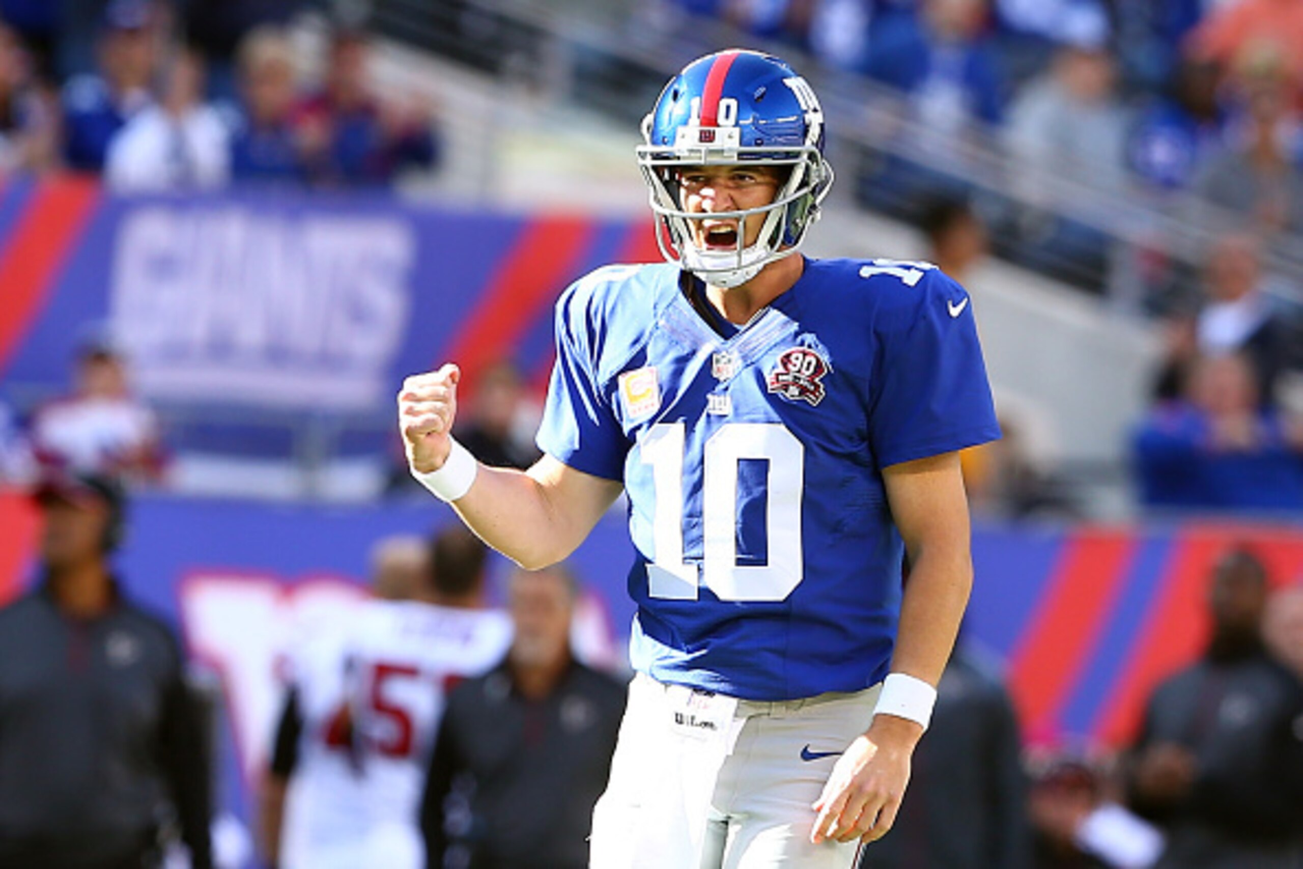 EAST RUTHERFORD, NJ - OCTOBER 05:  Quarterback Eli Manning #10 of the New York Giants celebrates a play in the fourth quarter against the Atlanta Falcons during their game at MetLife Stadium on October 5, 2014 in East Rutherford, New Jersey.  (Photo by El