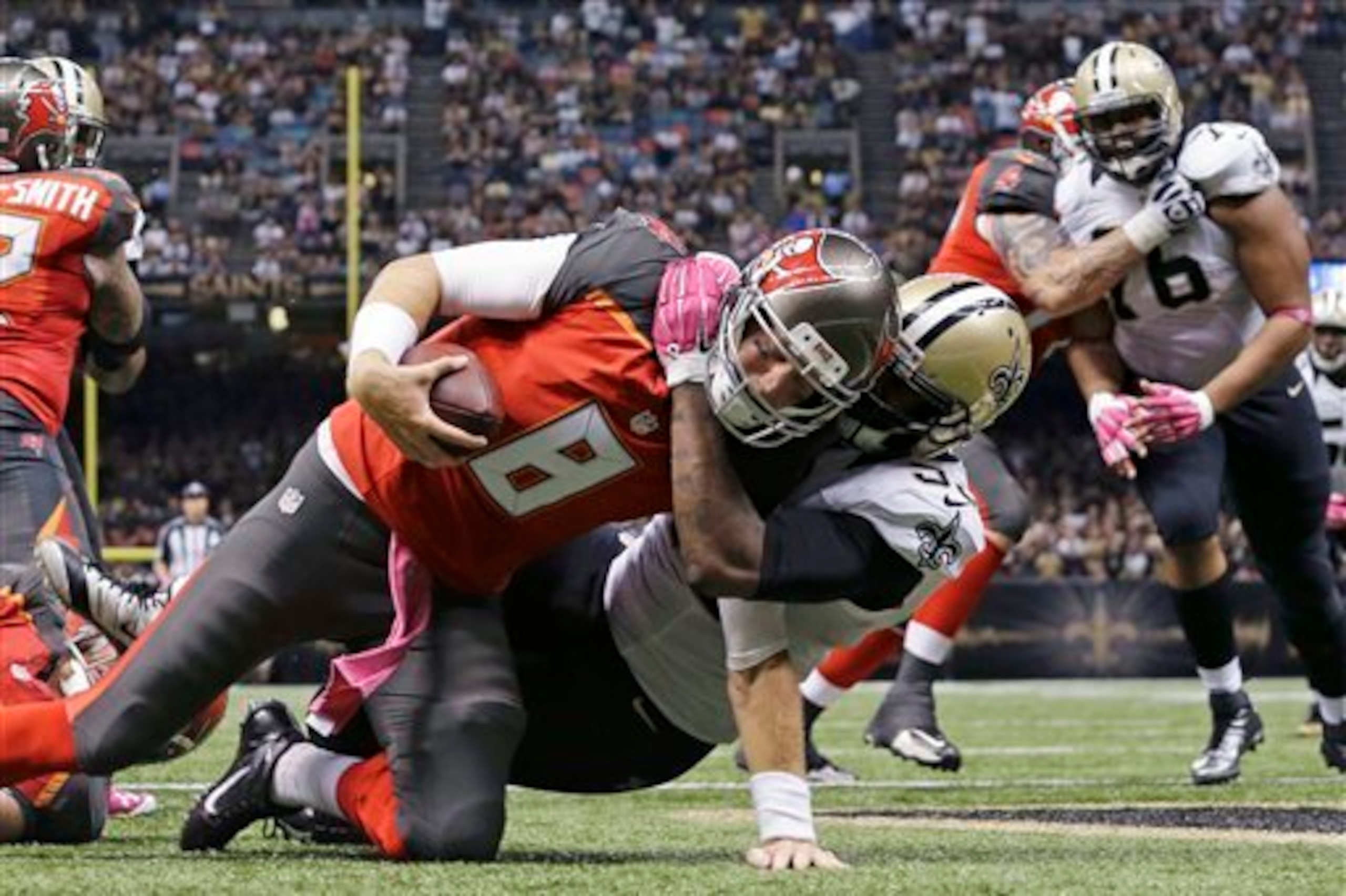 Saints LB Galette sacks Glennon for the safety.