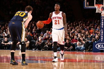 NEW YORK, NY - MARCH 7: Iman Shumpert #21 of the New York Knicks handles the ball against the Utah Jazz on March 7, 2014.  NOTE TO USER: User expressly acknowledges and agrees that, by downloading and or using this photograph, User is consenting to the te