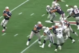 The lineman is too late. Mack swats down his arms with little resistance.